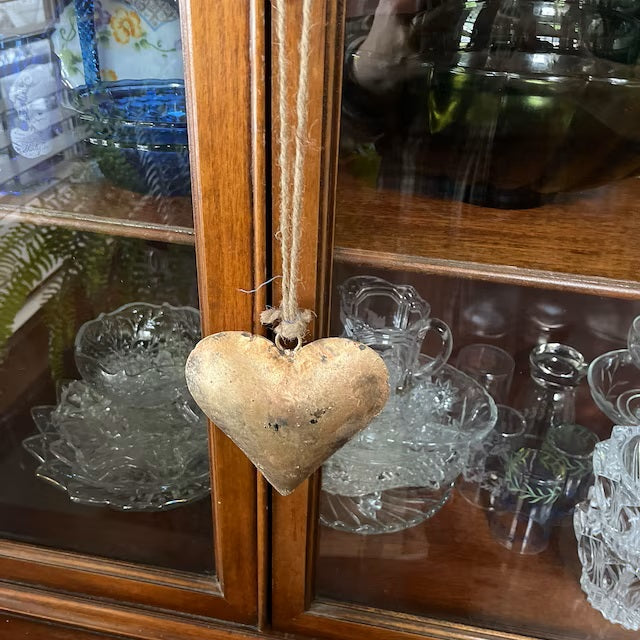 Handmade Indian metal crafts. Large, charming heart hangings made from recycled iron—perfect love gifts for weddings.