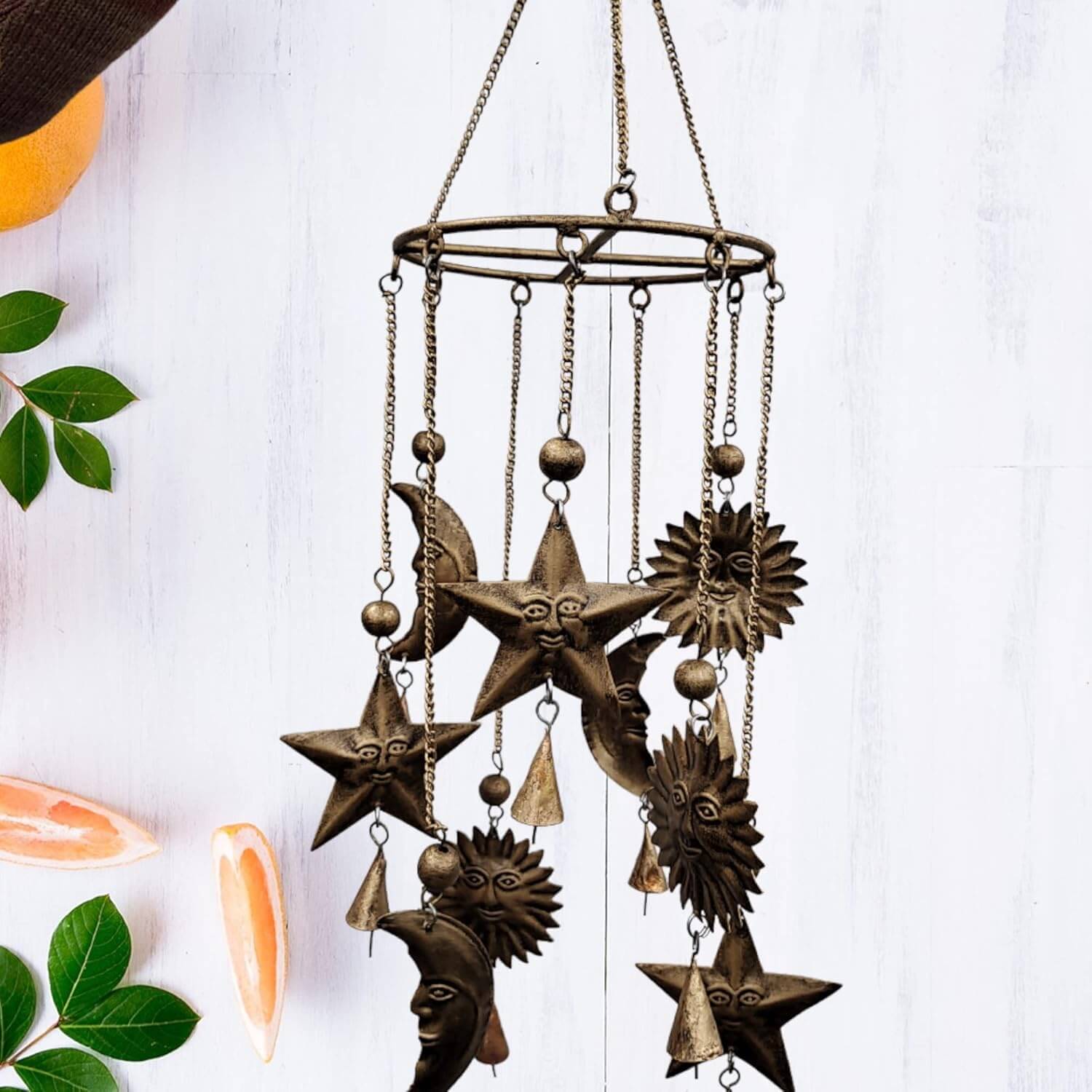 Antique sun moon wind chime bells in rustic gold, perfect for garden decor and outdoor hanging mobiles.