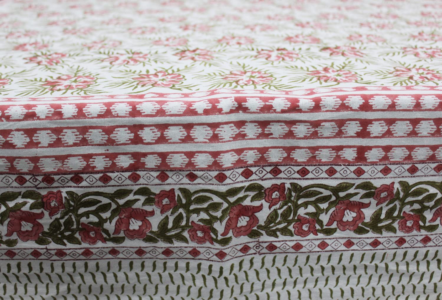 Pink floral hand block print tablecloth, 100% cotton, perfect for dining, parties, or holiday decor.