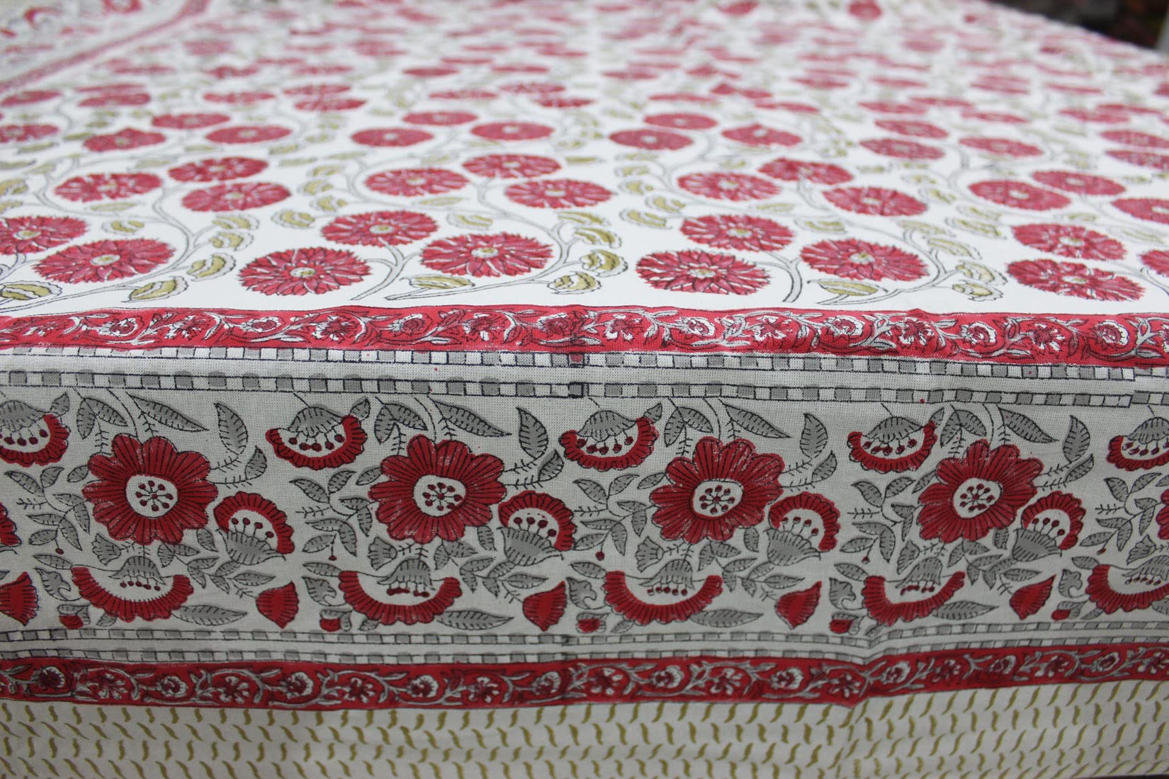 Red and white floral hand block print tablecloth showcasing intricate designs, perfect for dining and special occasions.