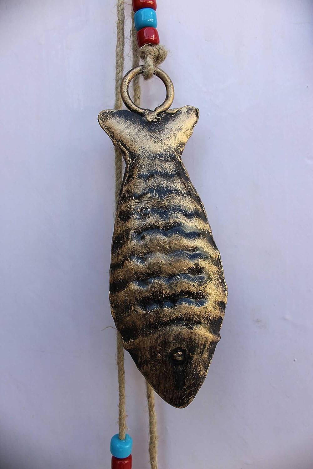 Enhance your home decor with our 78 cm recycled iron fish wall hanging. Perfect for festive celebrations or everyday elegance.