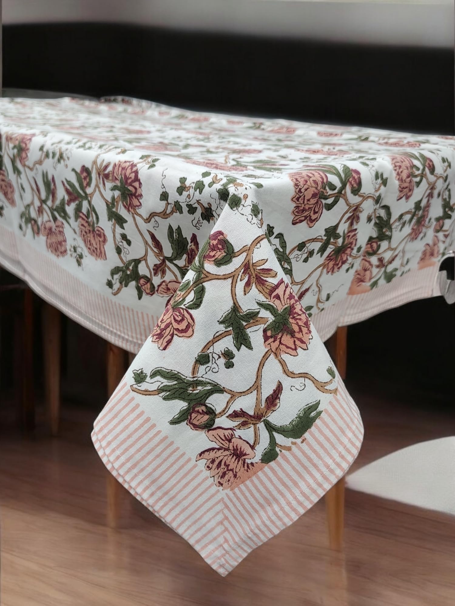White floral hand block print tablecloth on a dining table, ideal for weddings, parties, and seasonal decor.