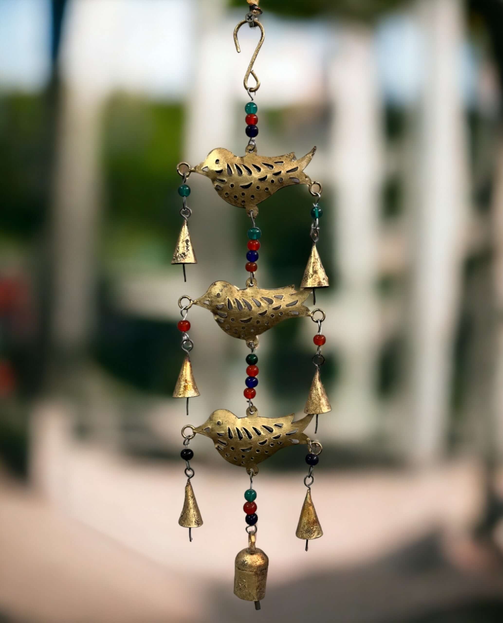 Enhance your space with this 48 cm metal birds chime, complete with beads and bells. Perfect for a stylish boho touch!