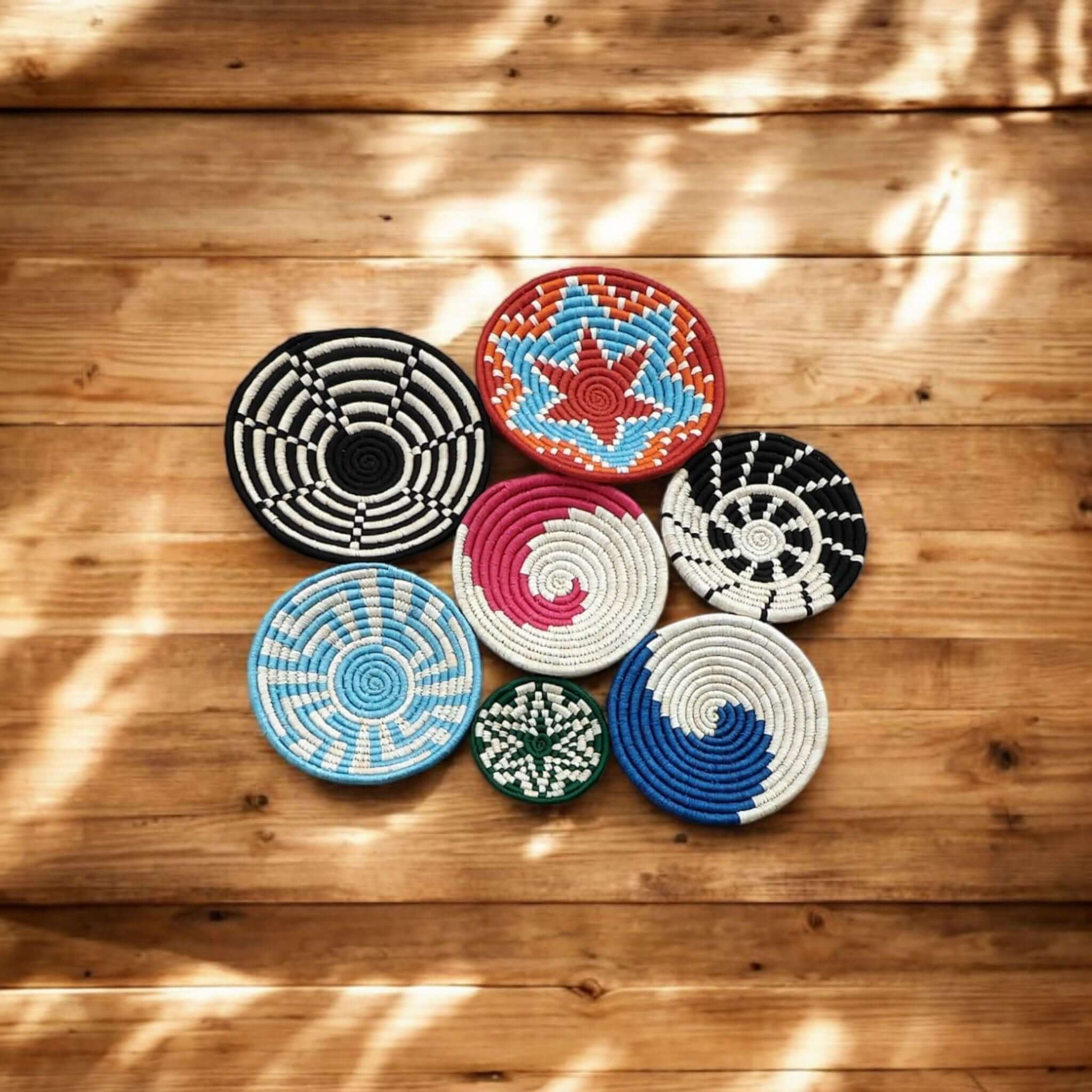 Handmade multicolor Sabai grass wall baskets, perfect for bohemian décor and eco-friendly storage solutions.