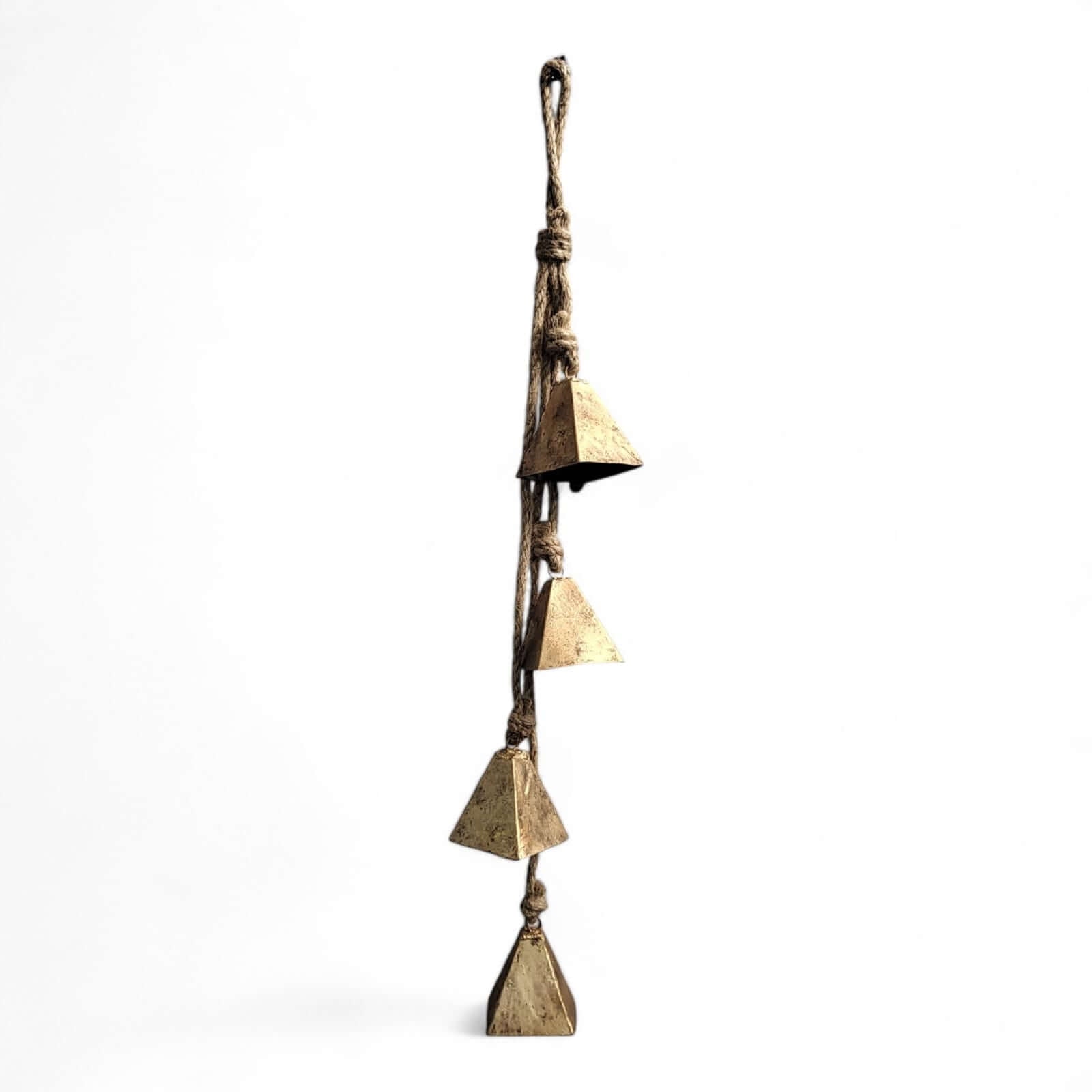 Rustic iron wind chime with three vintage metal bells and jute rope, perfect for home or garden decoration.