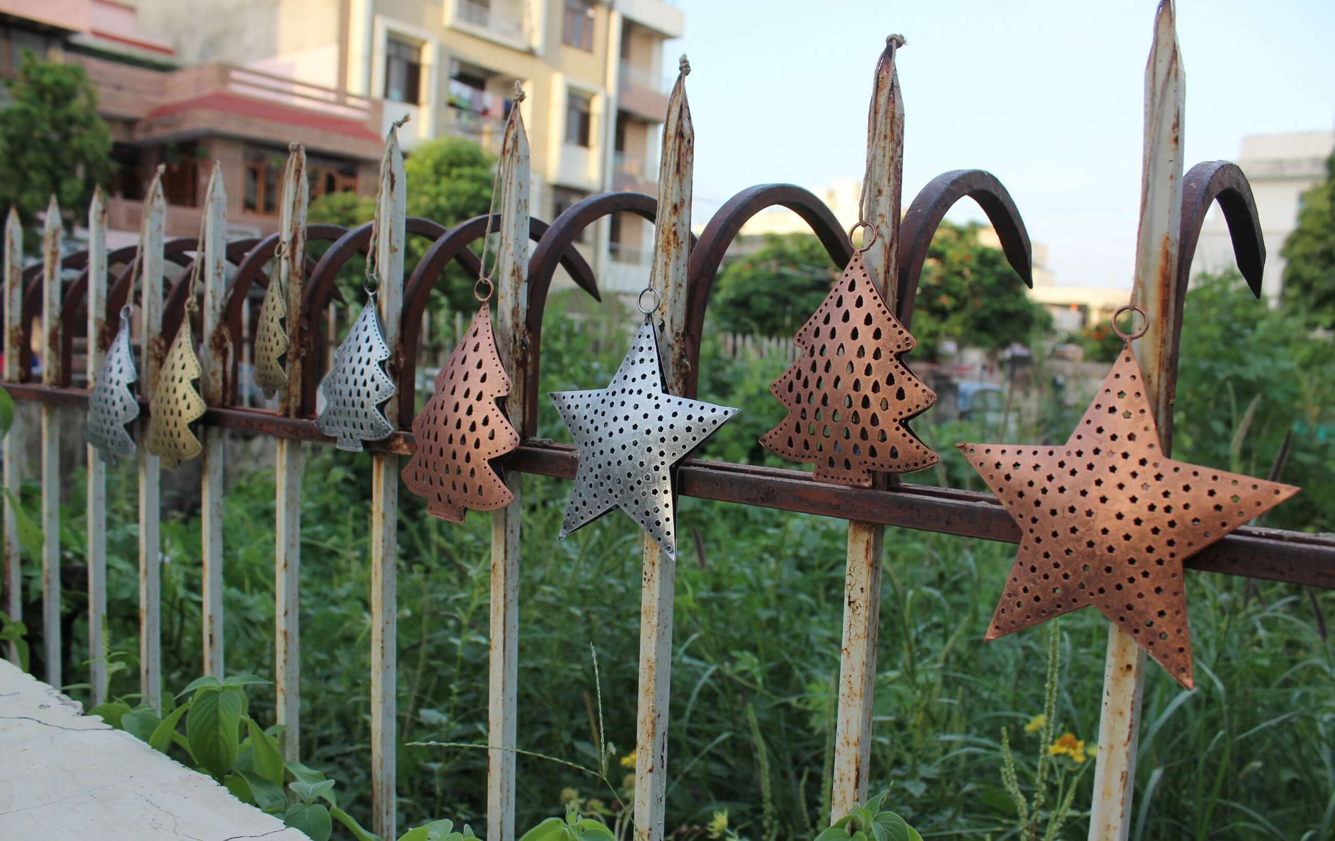 Festive recycled iron ornaments with unique designs. Durable, lightweight, and perfect for your Christmas tree decor!