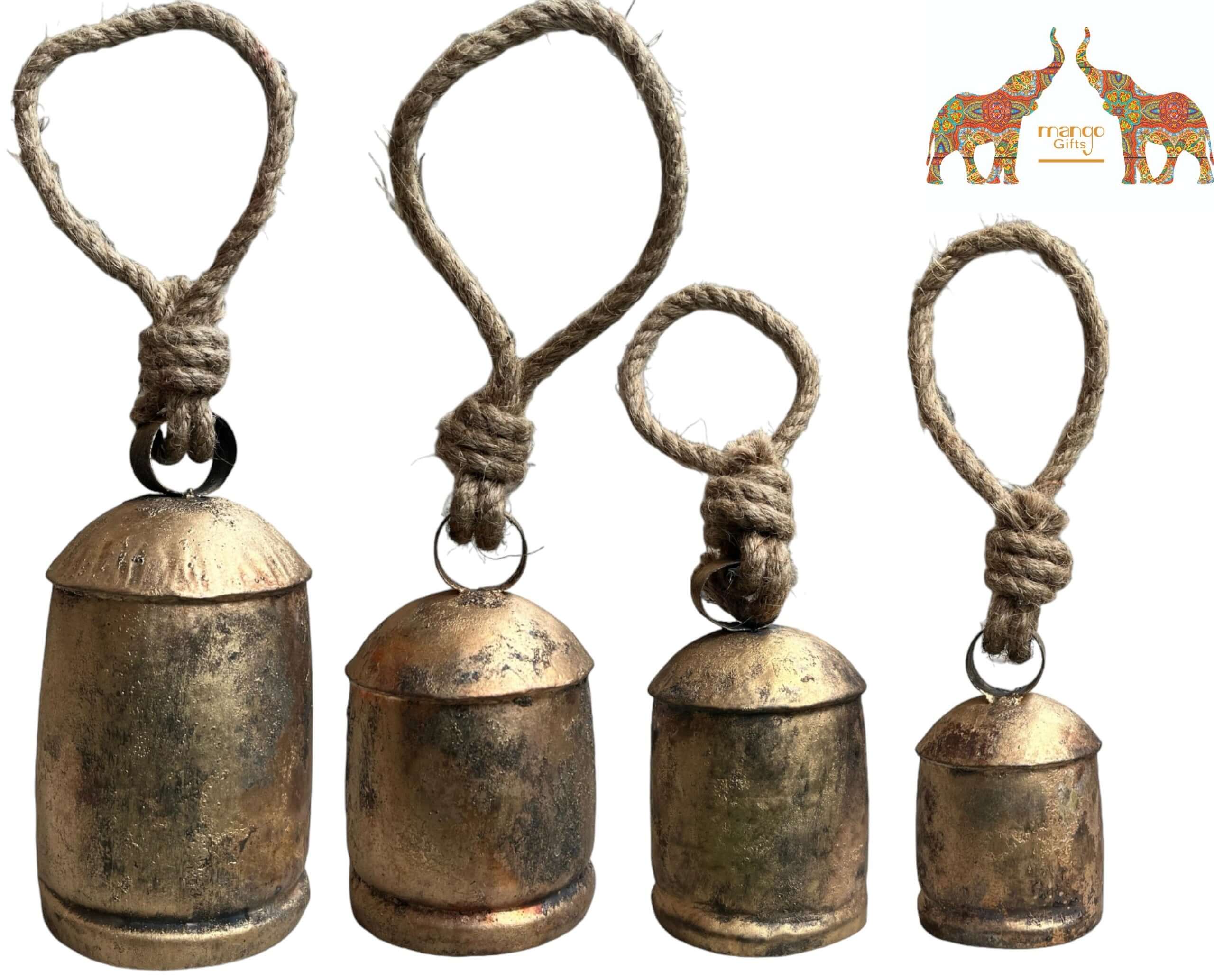 Set of 4 giant antique gold rustic cow bells with jute rope, handcrafted, vintage style, ideal for garden decoration.