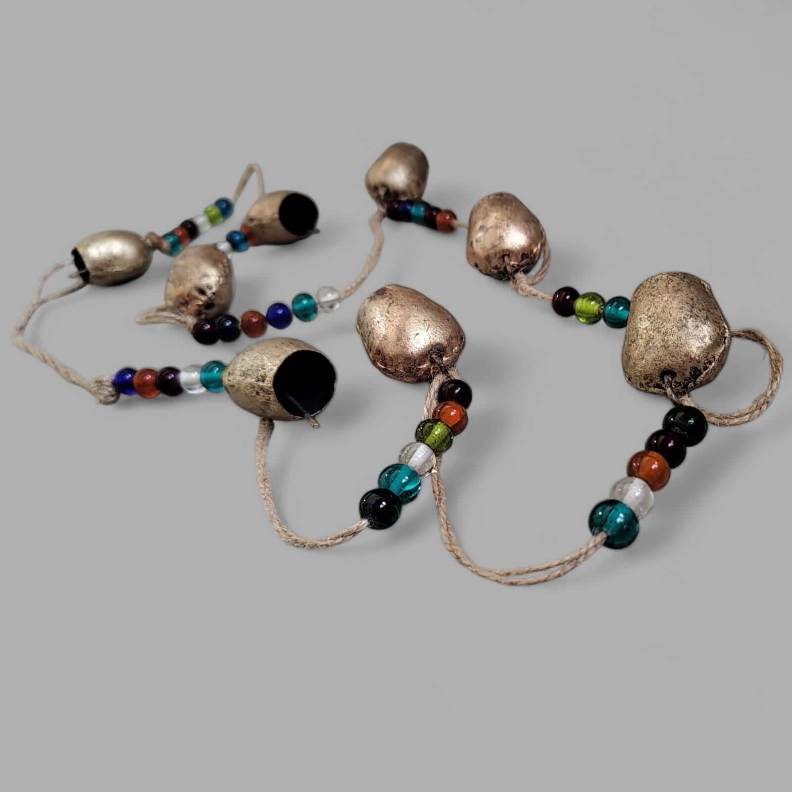 Rustic Shabby Chic Bells Hanging Garland with Glass Beads and Jute Twine featuring 8 dome-shaped bells.