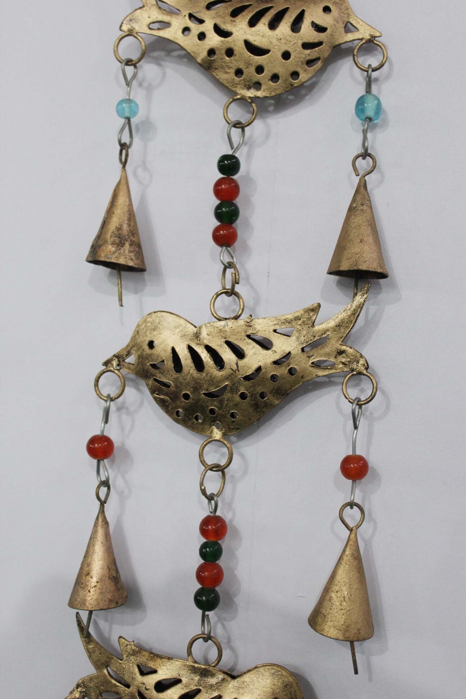 Enhance your space with this 48 cm metal birds chime, complete with beads and bells. Perfect for a stylish boho touch!