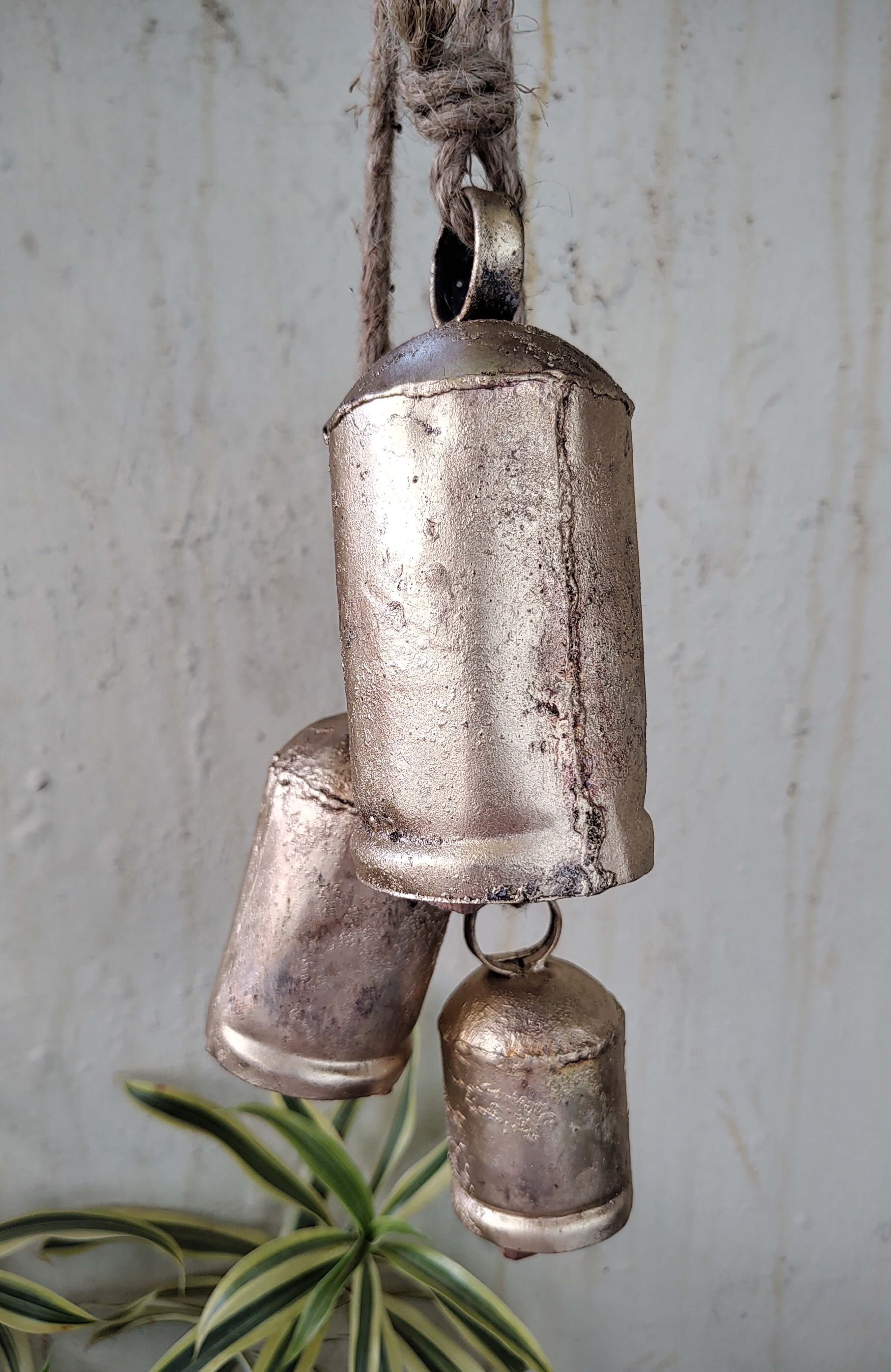 Enhance your decor with handmade antique finish cow bells, perfect for Christmas and rustic elegance. Experience harmony and vintage charm!