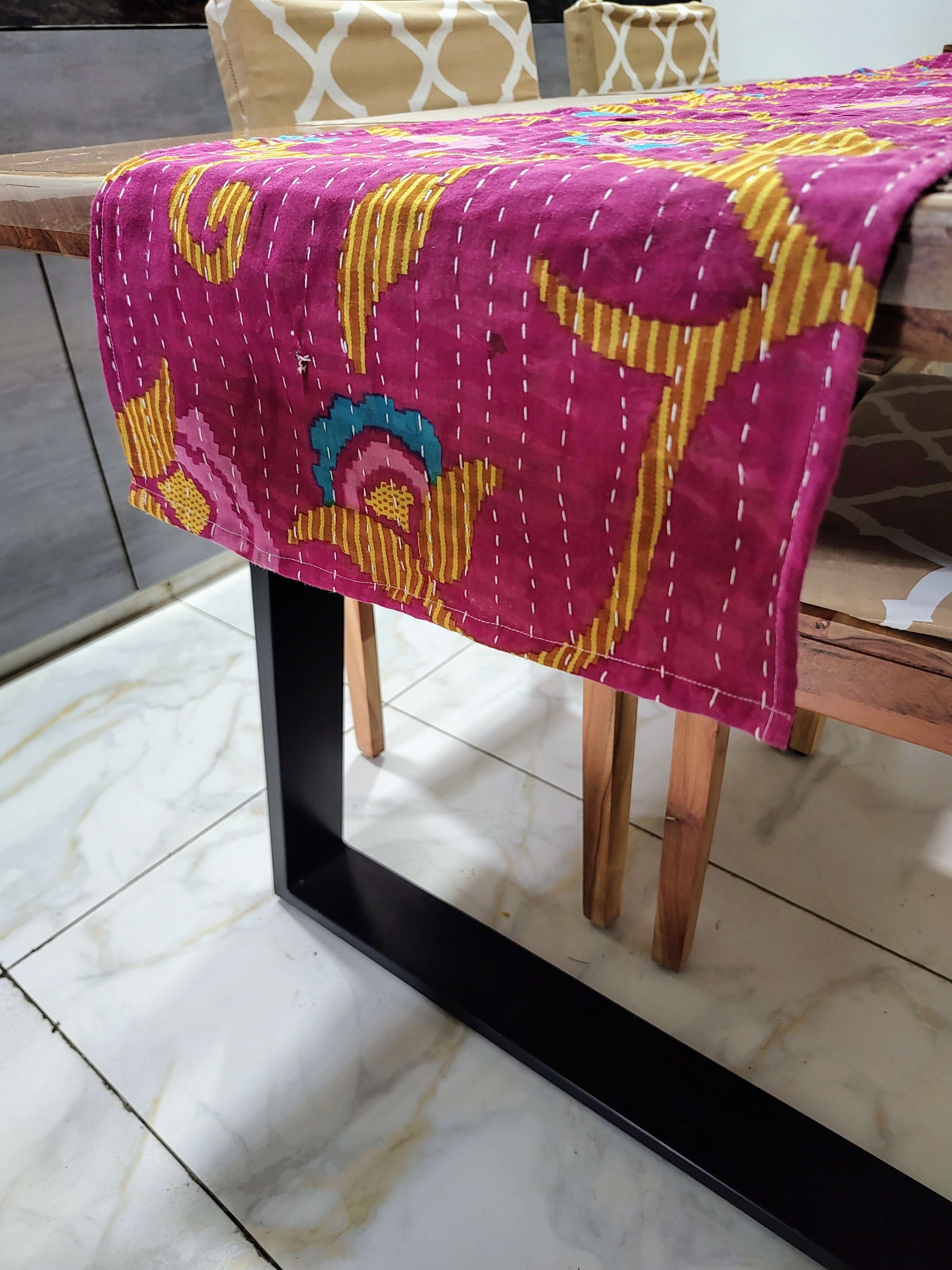 Cotton Floral Tapestry Table Runner with vibrant pink floral patterns.