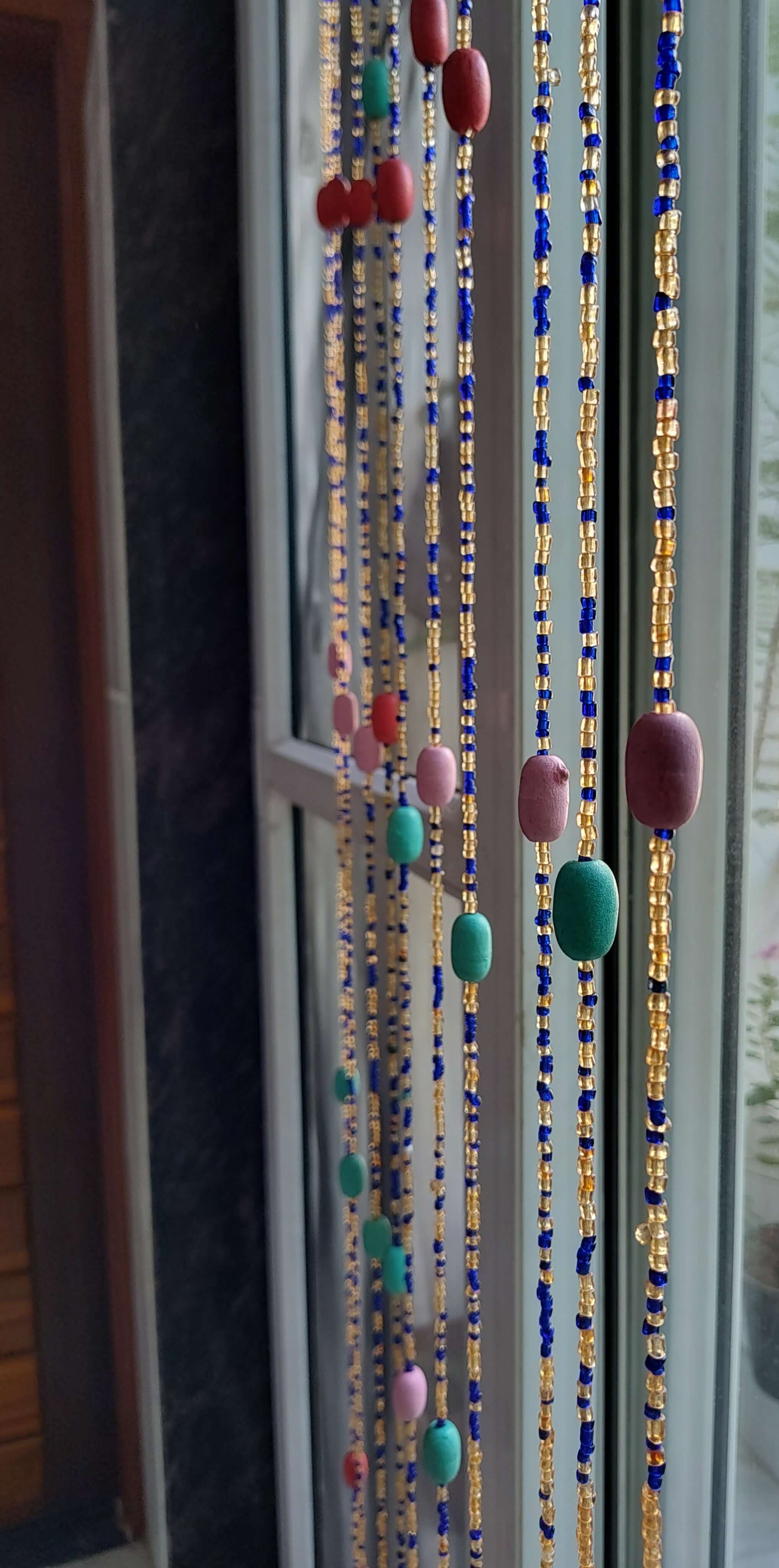 Elevate your space with our Bohemian Glass Beaded Curtain, perfect for adding color and style to any room. Shop now!