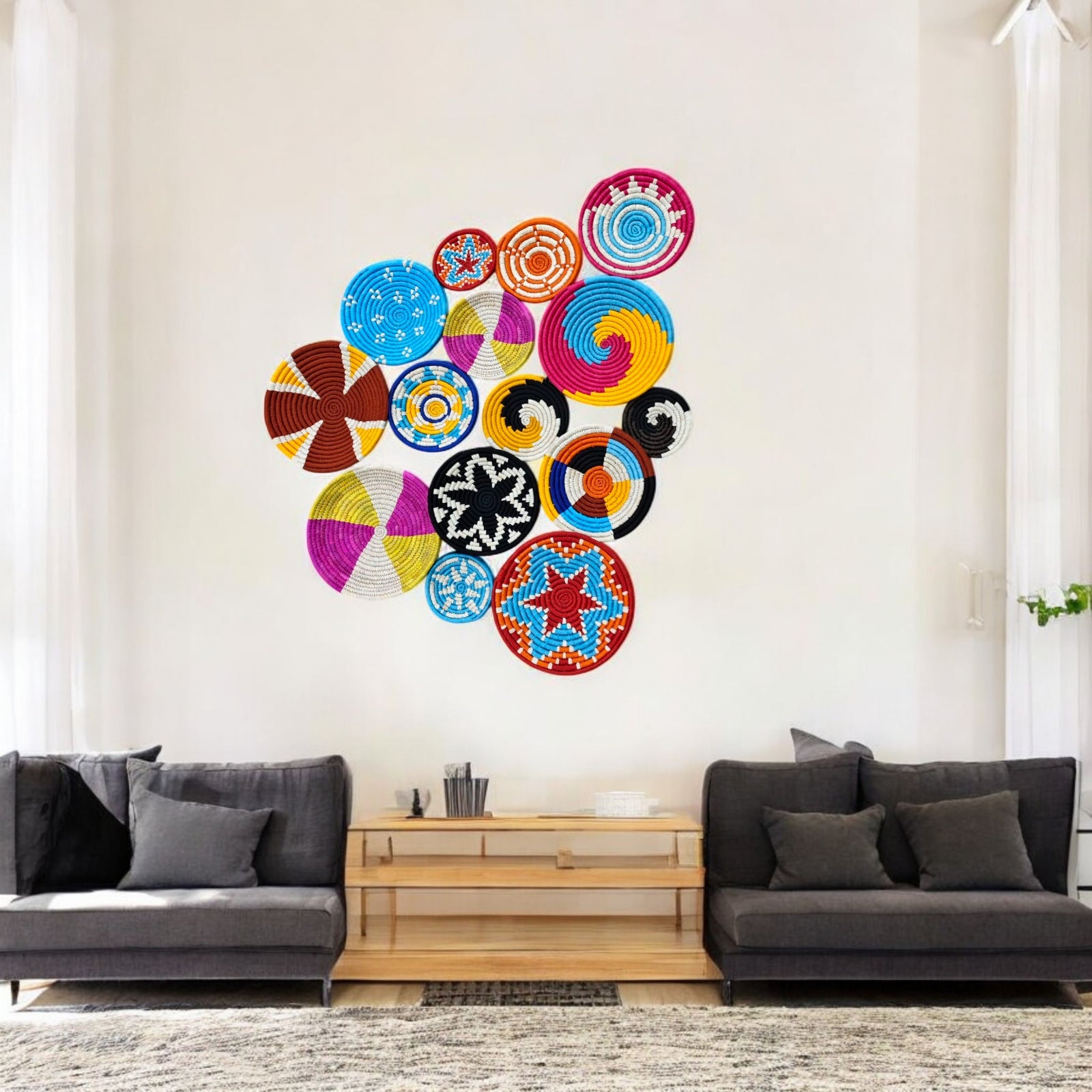 Colorful handmade Sabai grass wall baskets in a modern living room, perfect for boho wall decor.