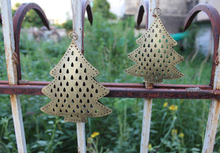 Festive recycled iron ornaments with unique designs. Durable, lightweight, and perfect for your Christmas tree decor!