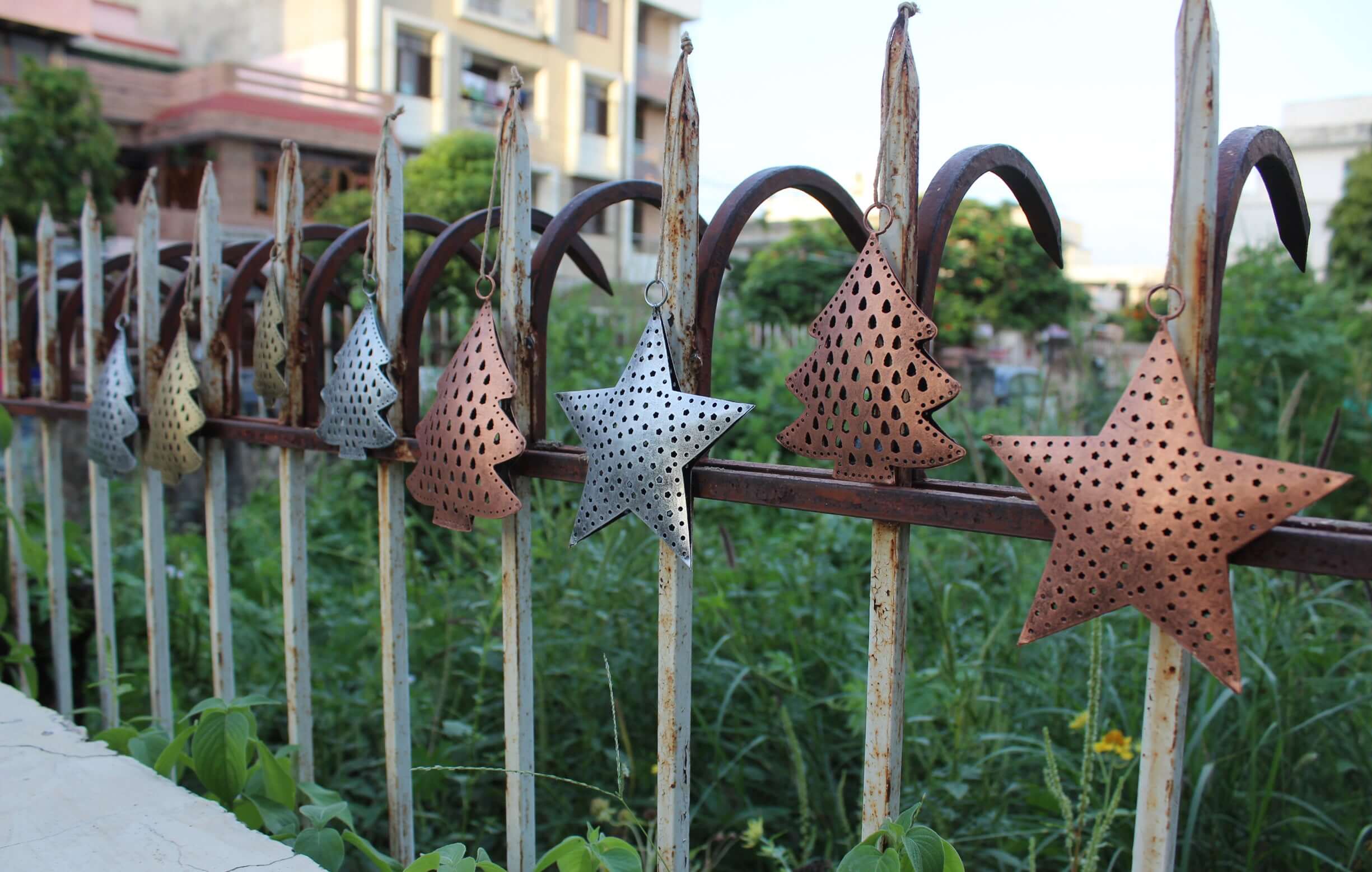 Festive recycled iron ornaments with unique designs. Durable, lightweight, and perfect for your Christmas tree decor!