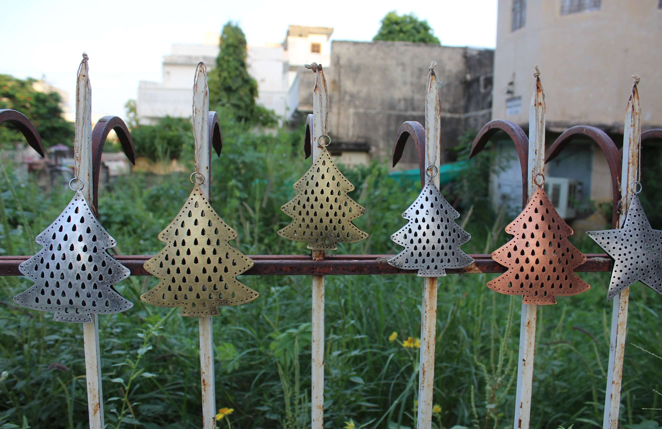 Festive recycled iron ornaments with unique designs. Durable, lightweight, and perfect for your Christmas tree decor!