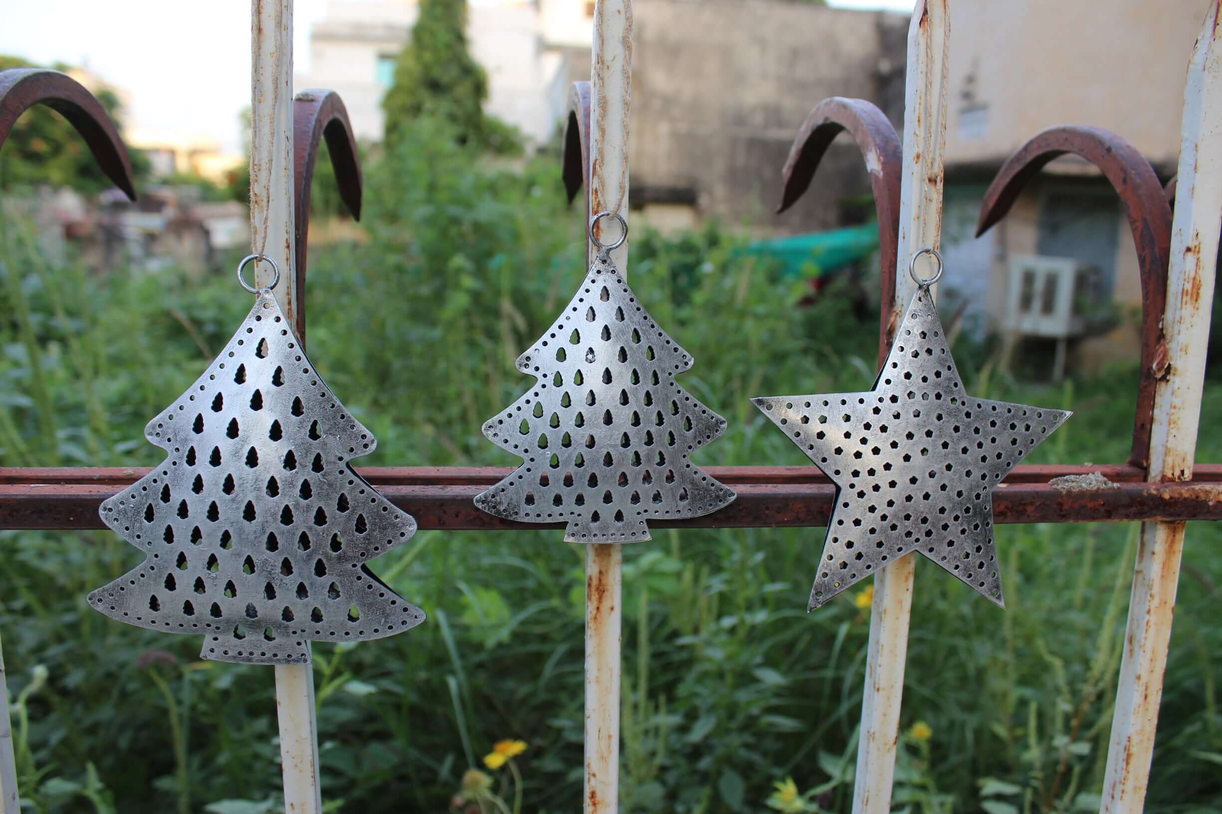 Festive recycled iron ornaments with unique designs. Durable, lightweight, and perfect for your Christmas tree decor!