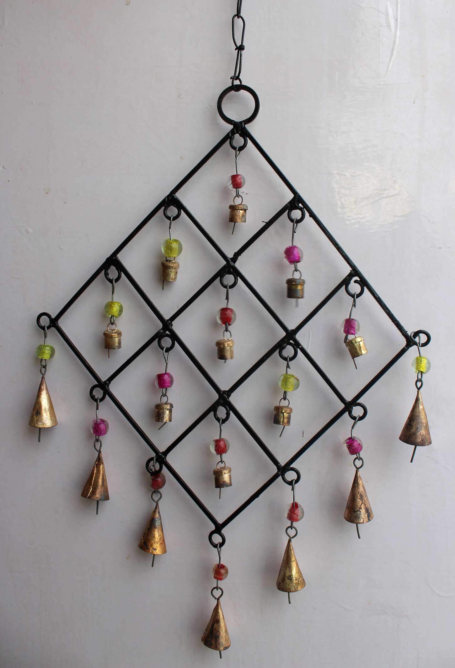 Enhance your space with our recycled iron wind chime bells, perfect for indoor or outdoor decor. Handcrafted in India with love.