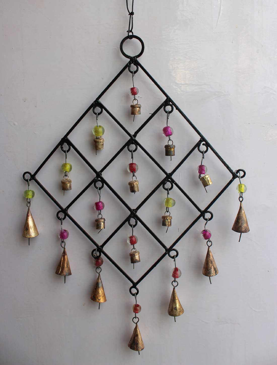 Enhance your space with our recycled iron wind chime bells, perfect for indoor or outdoor decor. Handcrafted in India with love.