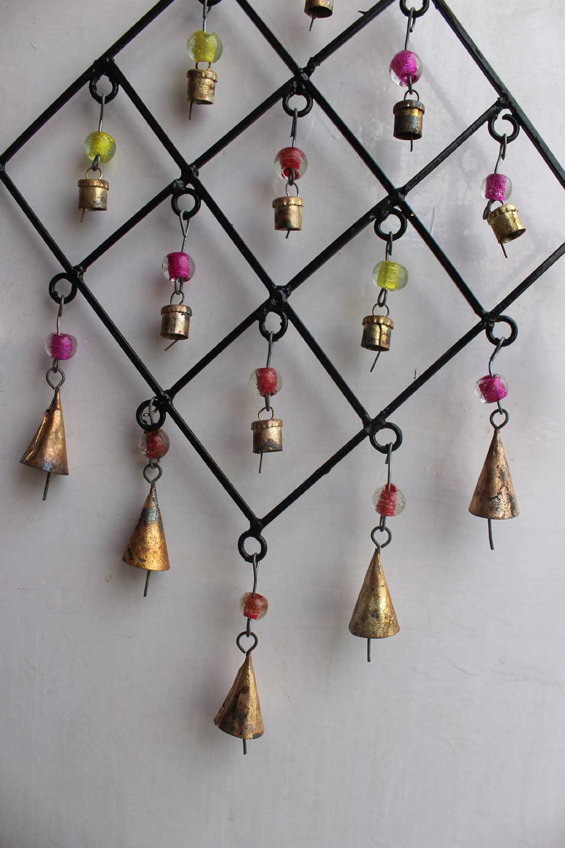 Enhance your space with our recycled iron wind chime bells, perfect for indoor or outdoor decor. Handcrafted in India with love.