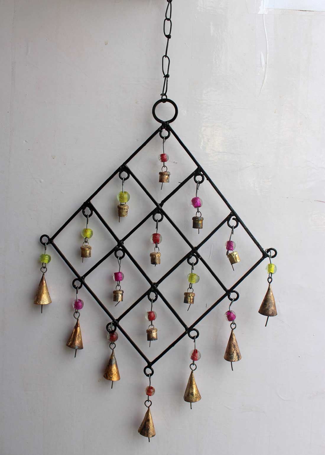 Enhance your space with our recycled iron wind chime bells, perfect for indoor or outdoor decor. Handcrafted in India with love.