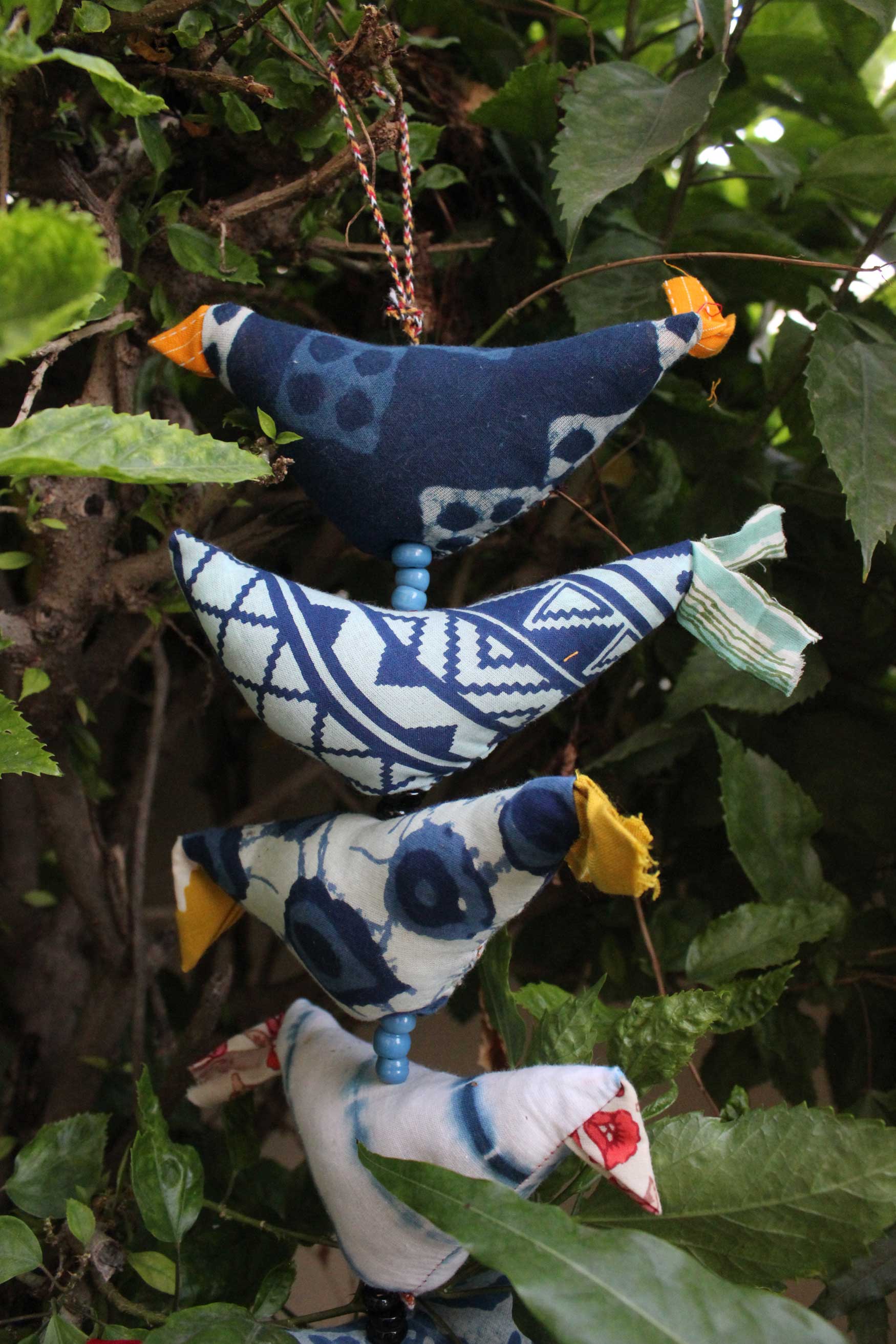 Handmade eco-friendly bird bells in indigo, perfect for unique décor. 100 cm height string with metal bells. Ideal gift for you!