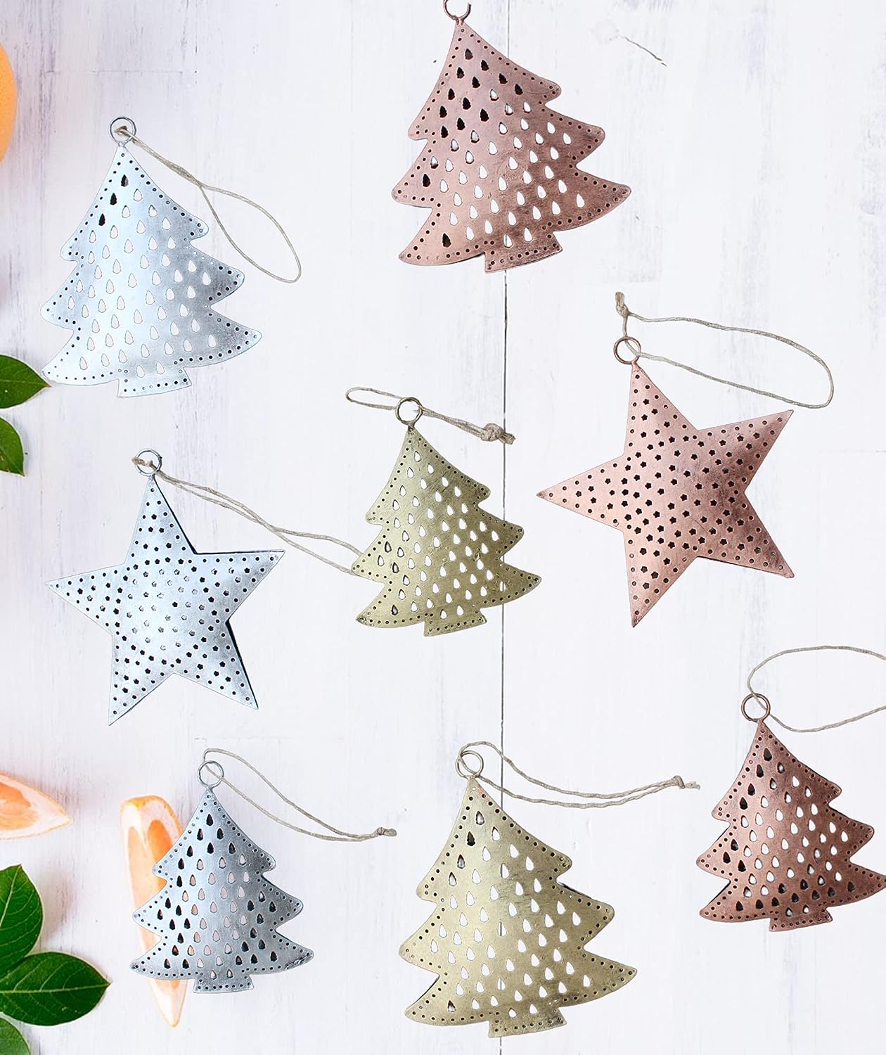 Festive recycled iron ornaments with unique designs. Durable, lightweight, and perfect for your Christmas tree decor!