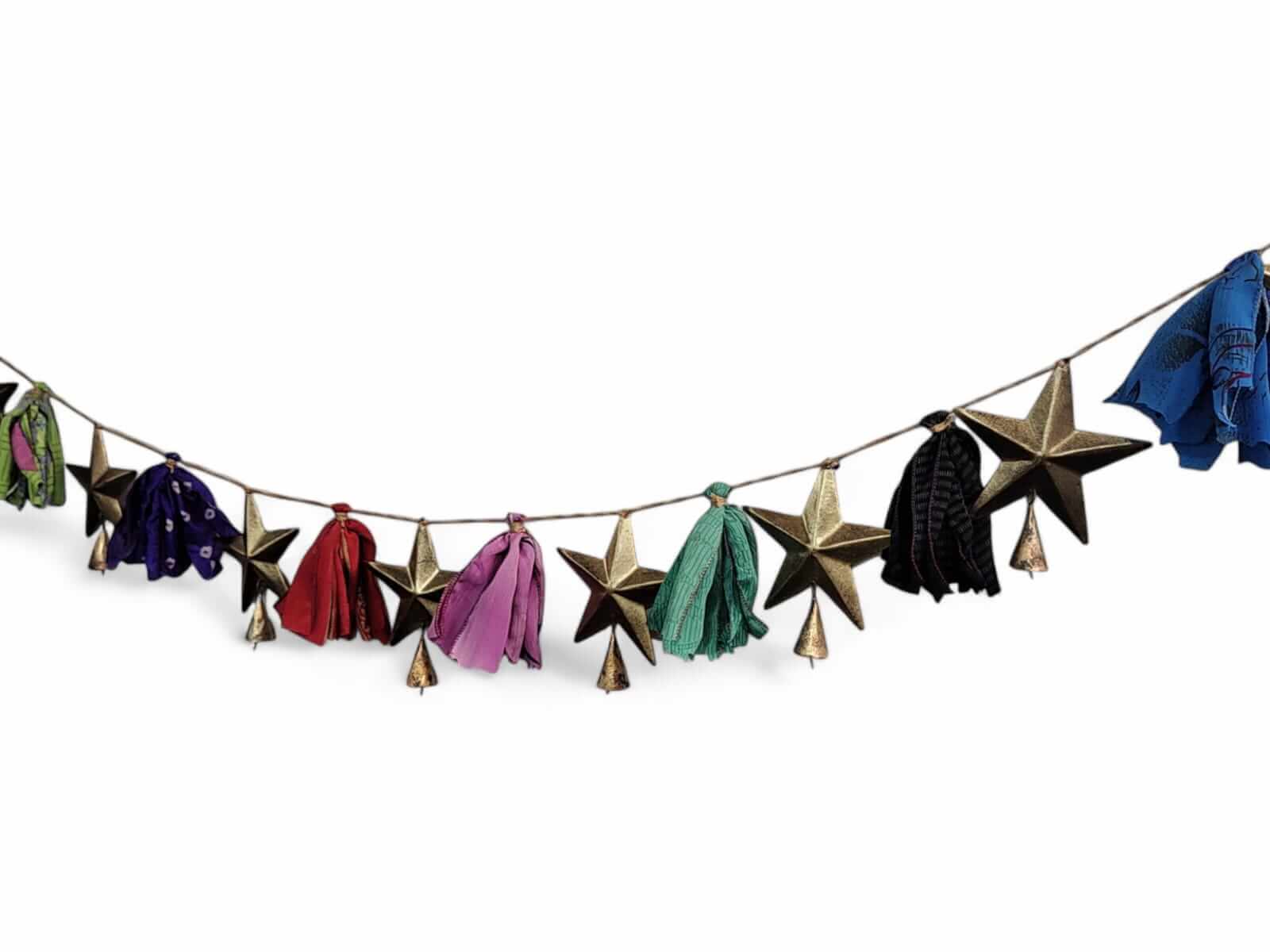 Handmade multicolour silk sari garland with metal stars and bells, perfect for Bohemian-style holiday décor.