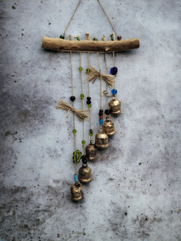 Enhance your space with this set of 5 handmade rustic wind chimes. Perfect for gardens or as a charming wall piece!