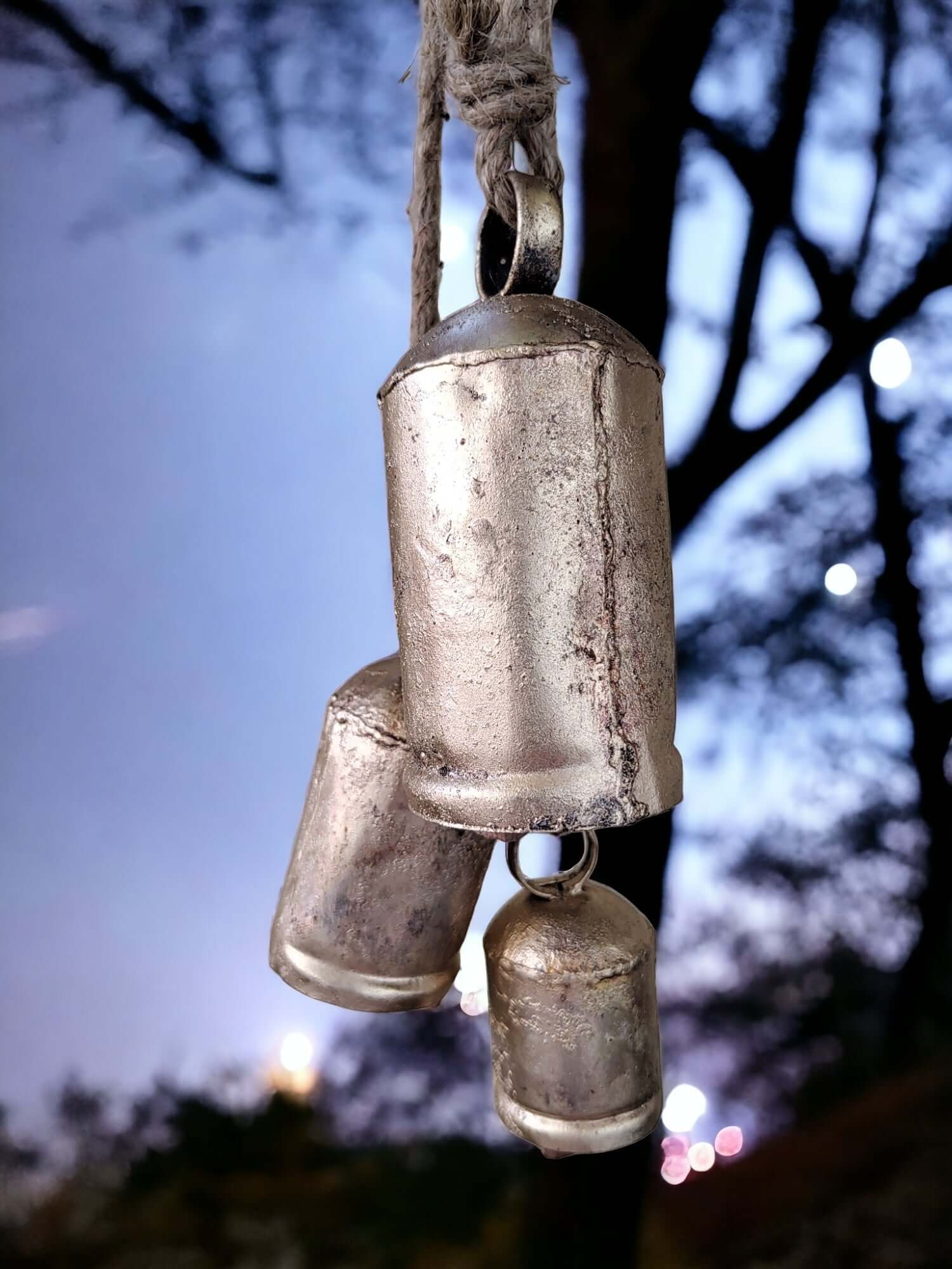 Enhance your decor with handmade antique finish cow bells, perfect for Christmas and rustic elegance. Experience harmony and vintage charm!
