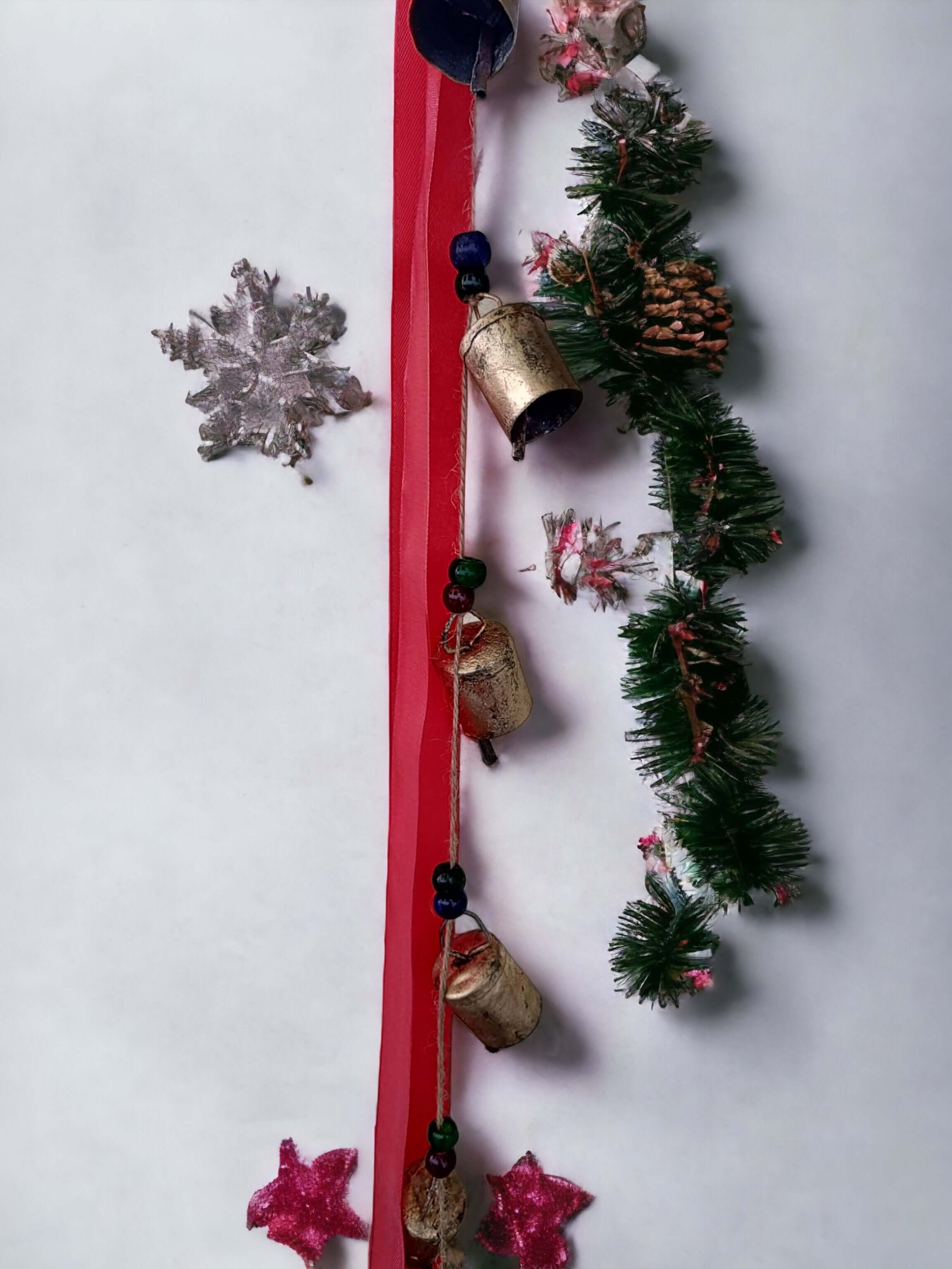 Discover 10 decorative vintage metal bells. Handmade in India, perfect for Christmas decor. Tinkling sound adds rustic charm to any space.