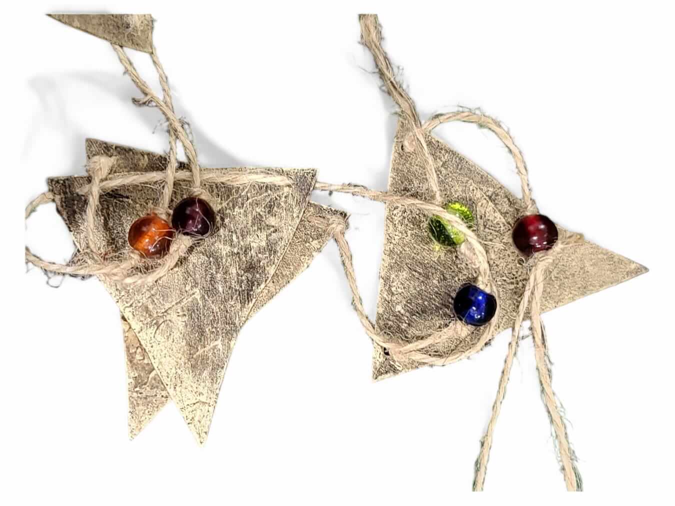 Recycled iron metal triangle bunting garland in antique gold with multicolor glass beads for bohemian party decoration.