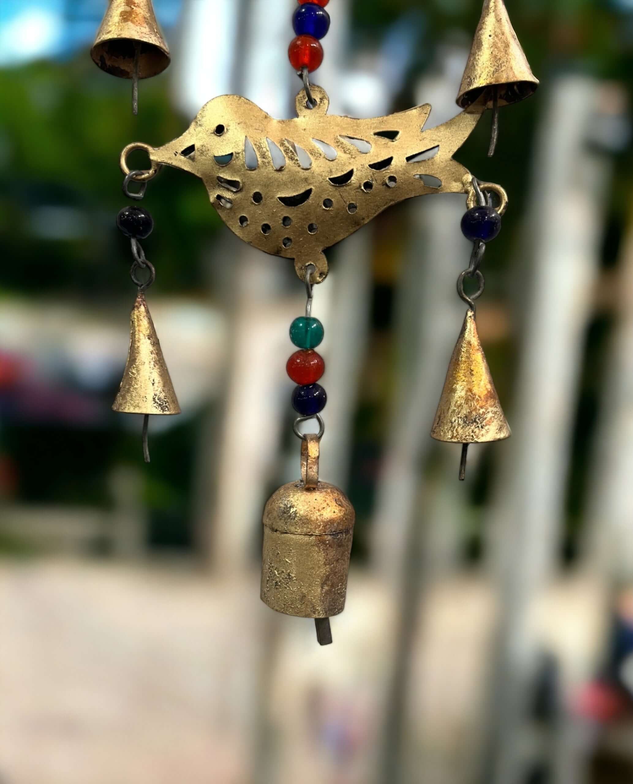 Enhance your space with this 48 cm metal birds chime, complete with beads and bells. Perfect for a stylish boho touch!
