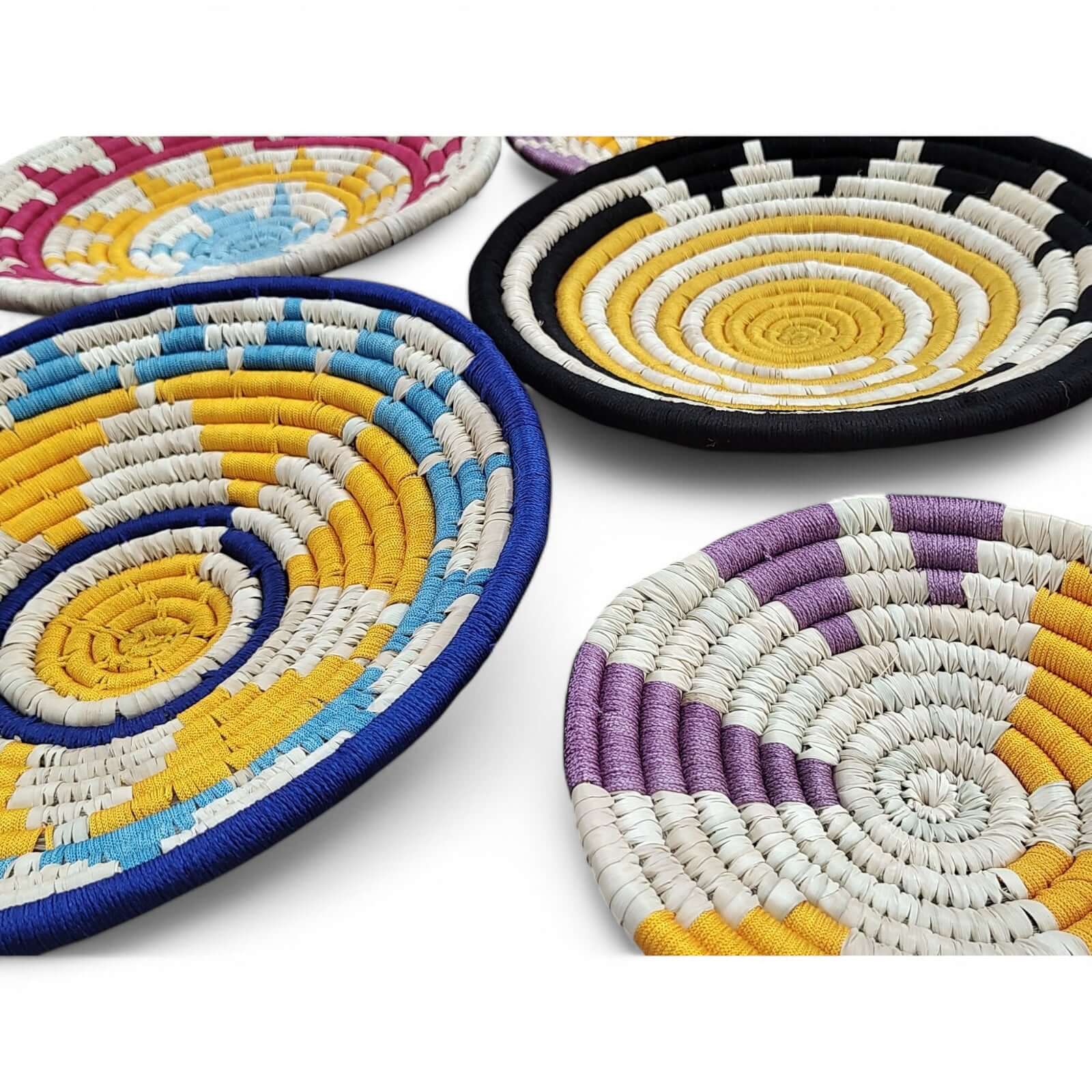 Colorful handwoven rattan baskets showcasing bohemian design, perfect for wall art or décor, part of Somerset collection.