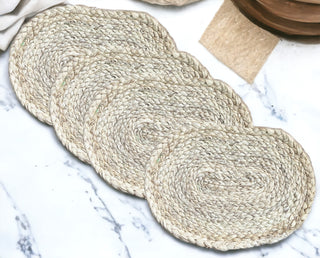 Handwoven natural placemats set, made from eco-friendly materials, perfect for stylish dining.