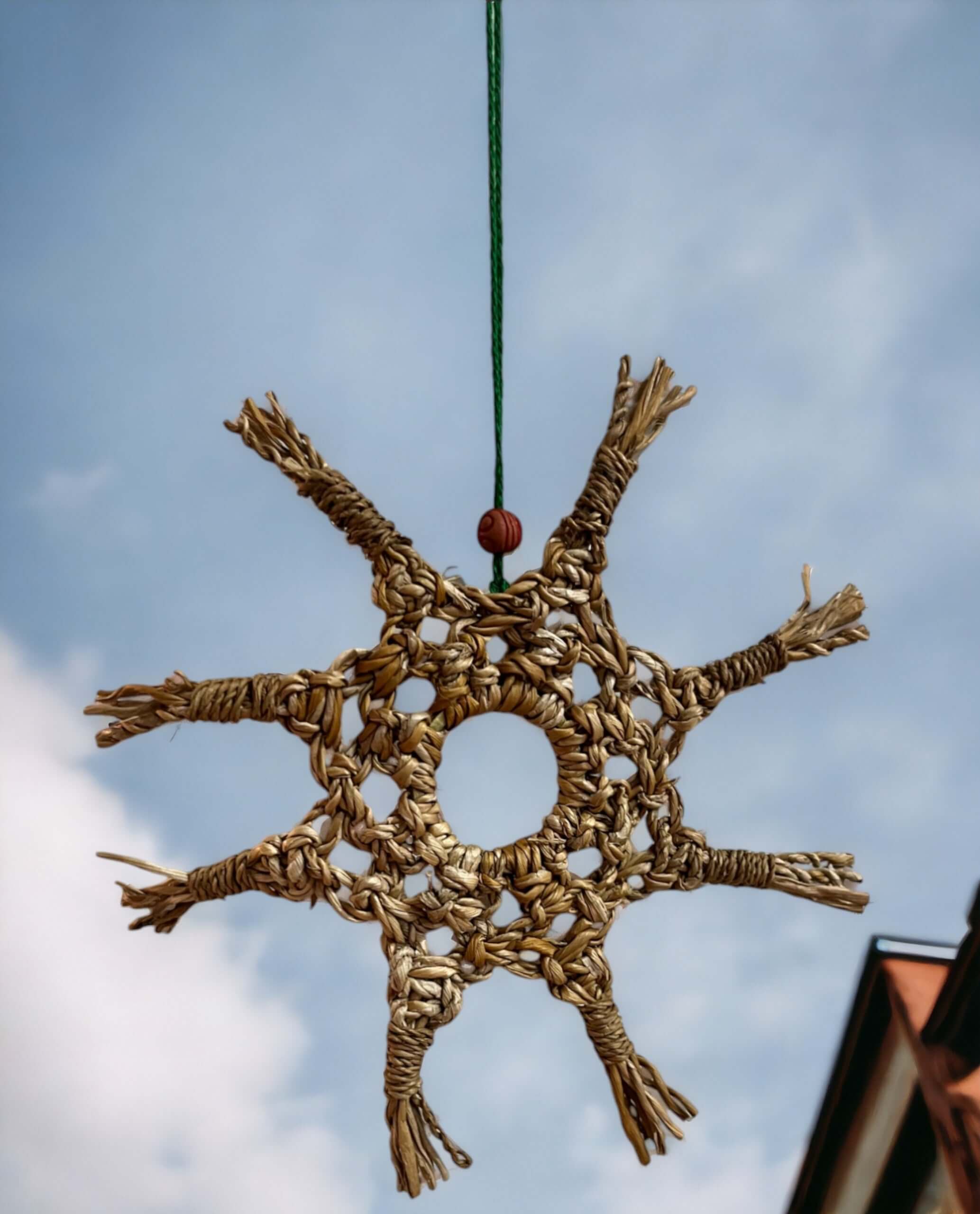 Handwoven star decoration ornament made from banana fibre, eco-friendly, lightweight, perfect for Christmas tree decor.