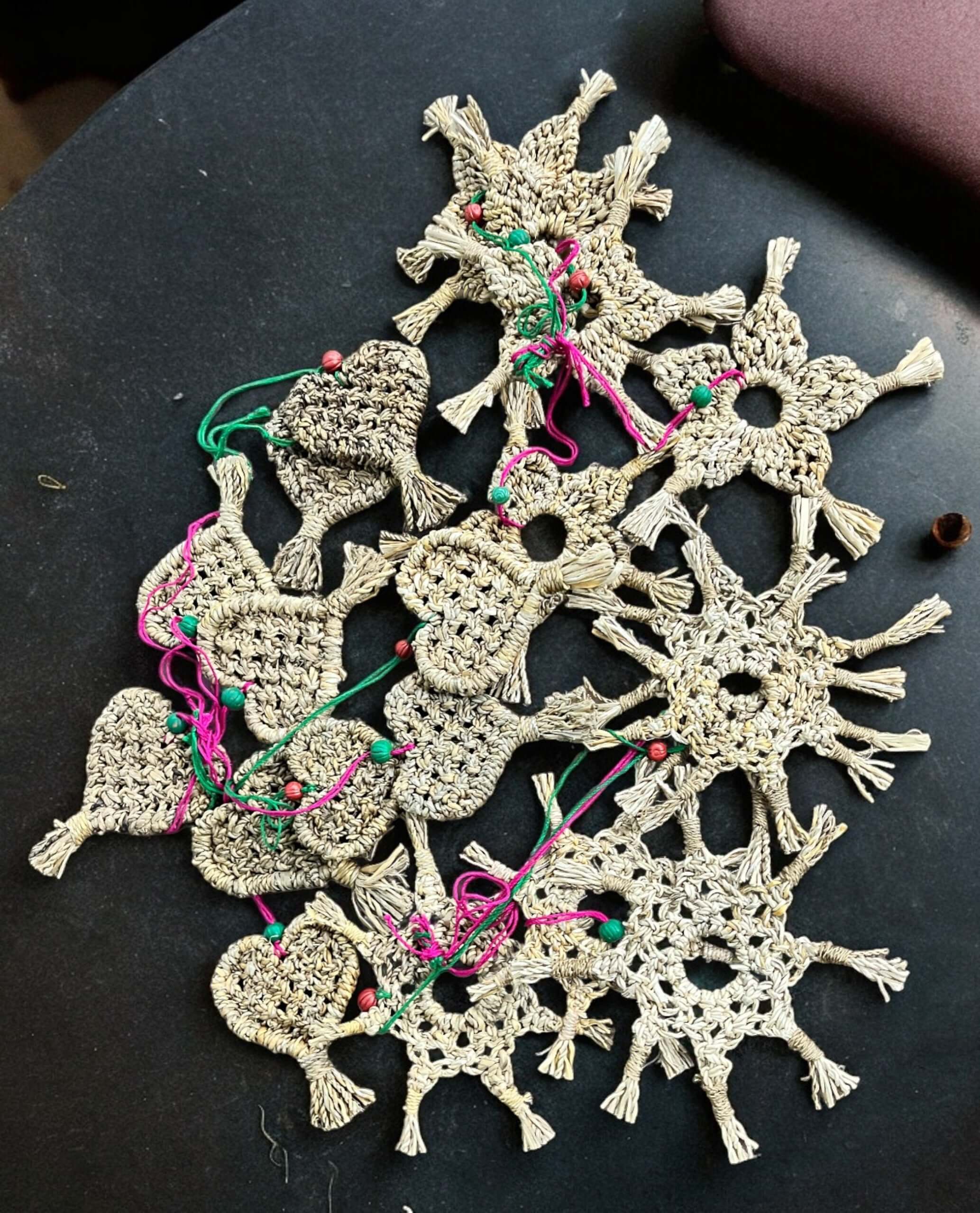 Handwoven star and heart ornaments made from banana fibre, eco-friendly Christmas tree decorations, 50 pieces mix.