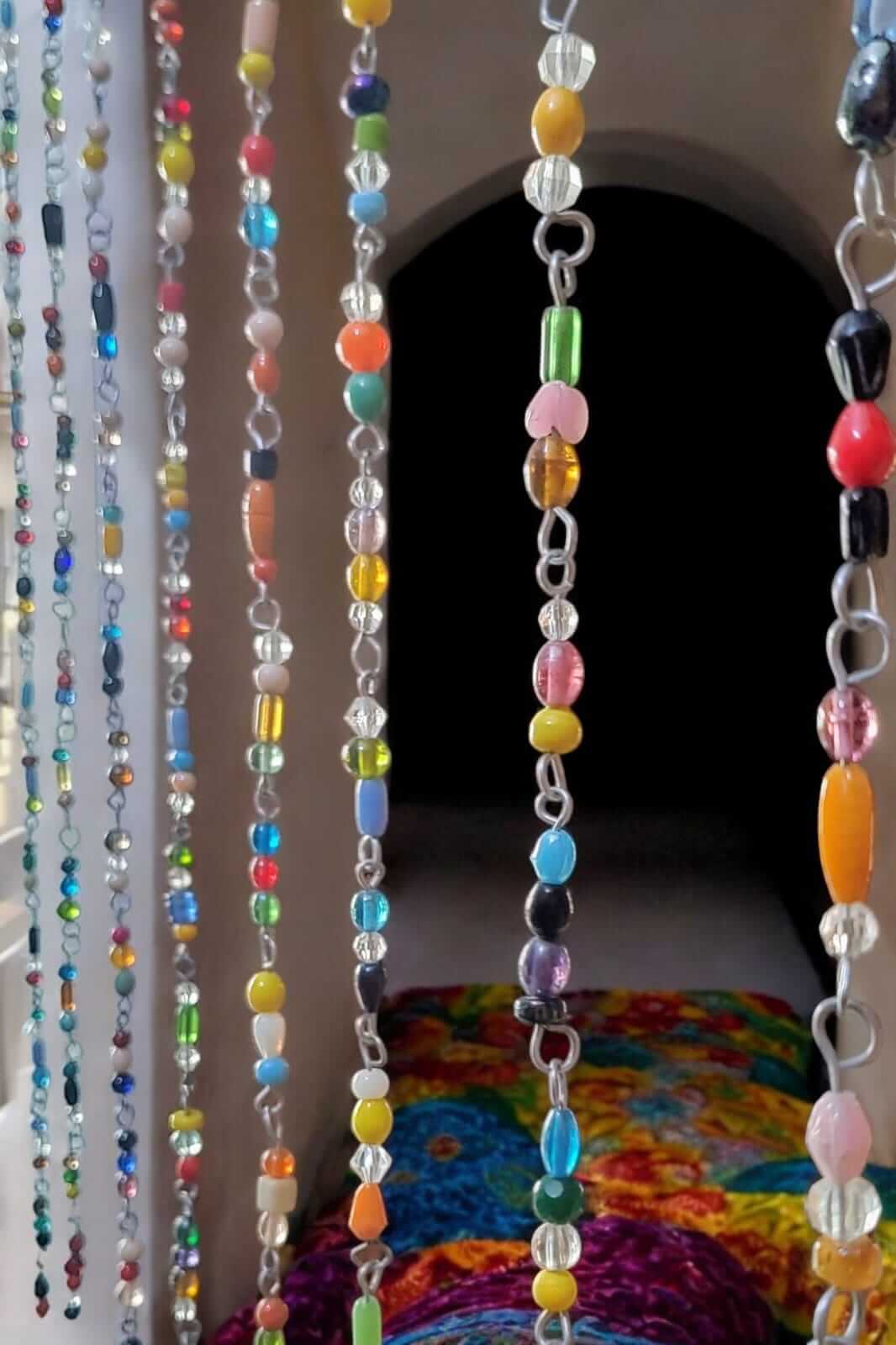 Colorful glass bead strands for bohemian curtain, perfect as hippie door beads or doorway beaded curtains.