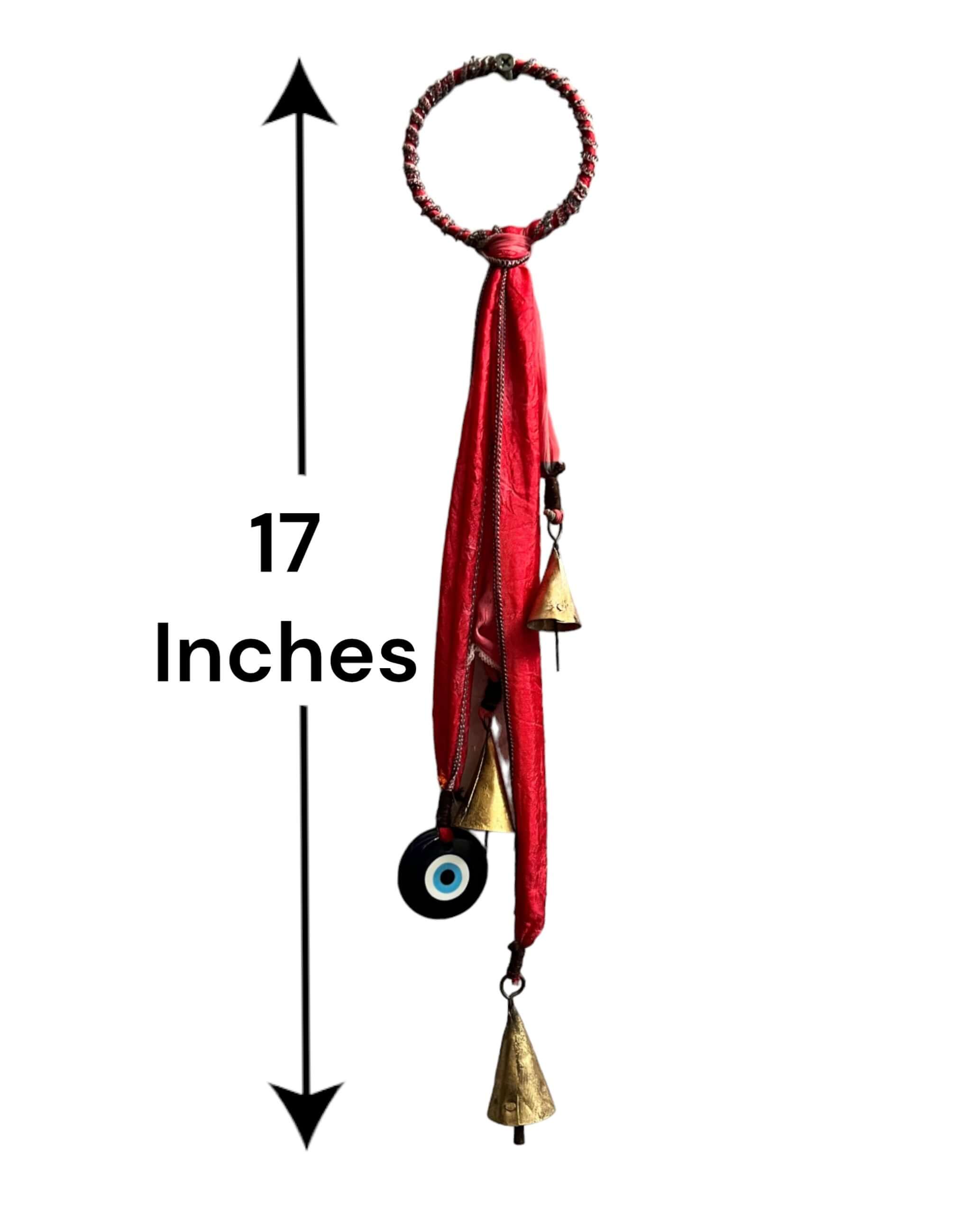 Handmade 17" metal Christmas bell door hanging ornament with colorful sari fabric and evil eye charm for bohemian decor.