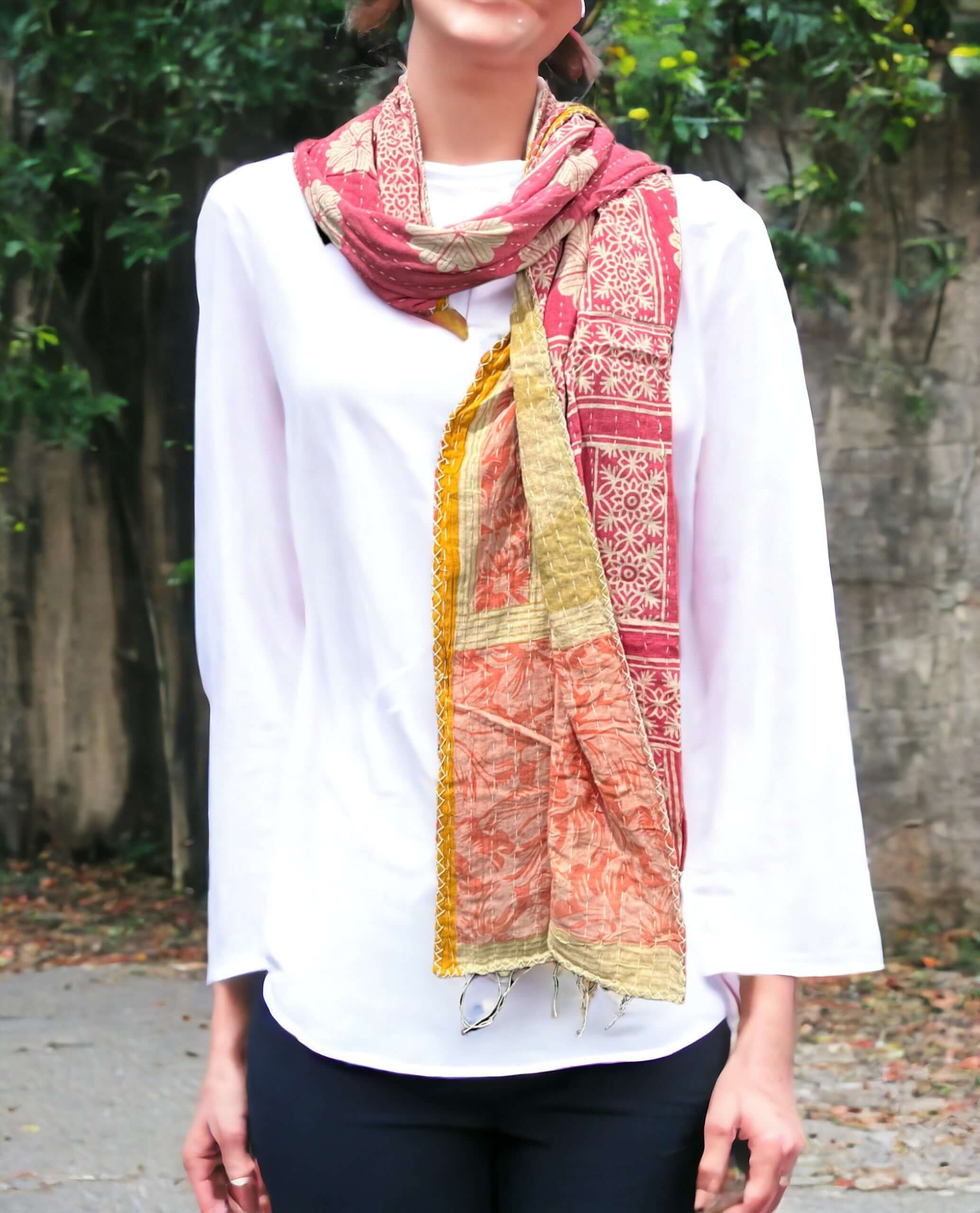 Vintage Kantha 100% cotton reversible scarf worn by a model, showcasing its multi-color design and unique patterns.