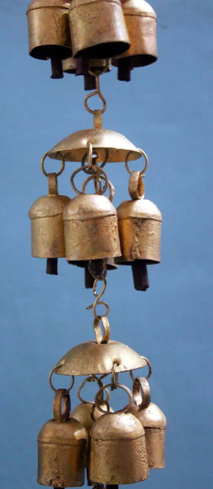 Antique gold wind chime featuring 13 rustic recycled iron bells, perfect for indoor and outdoor décor.