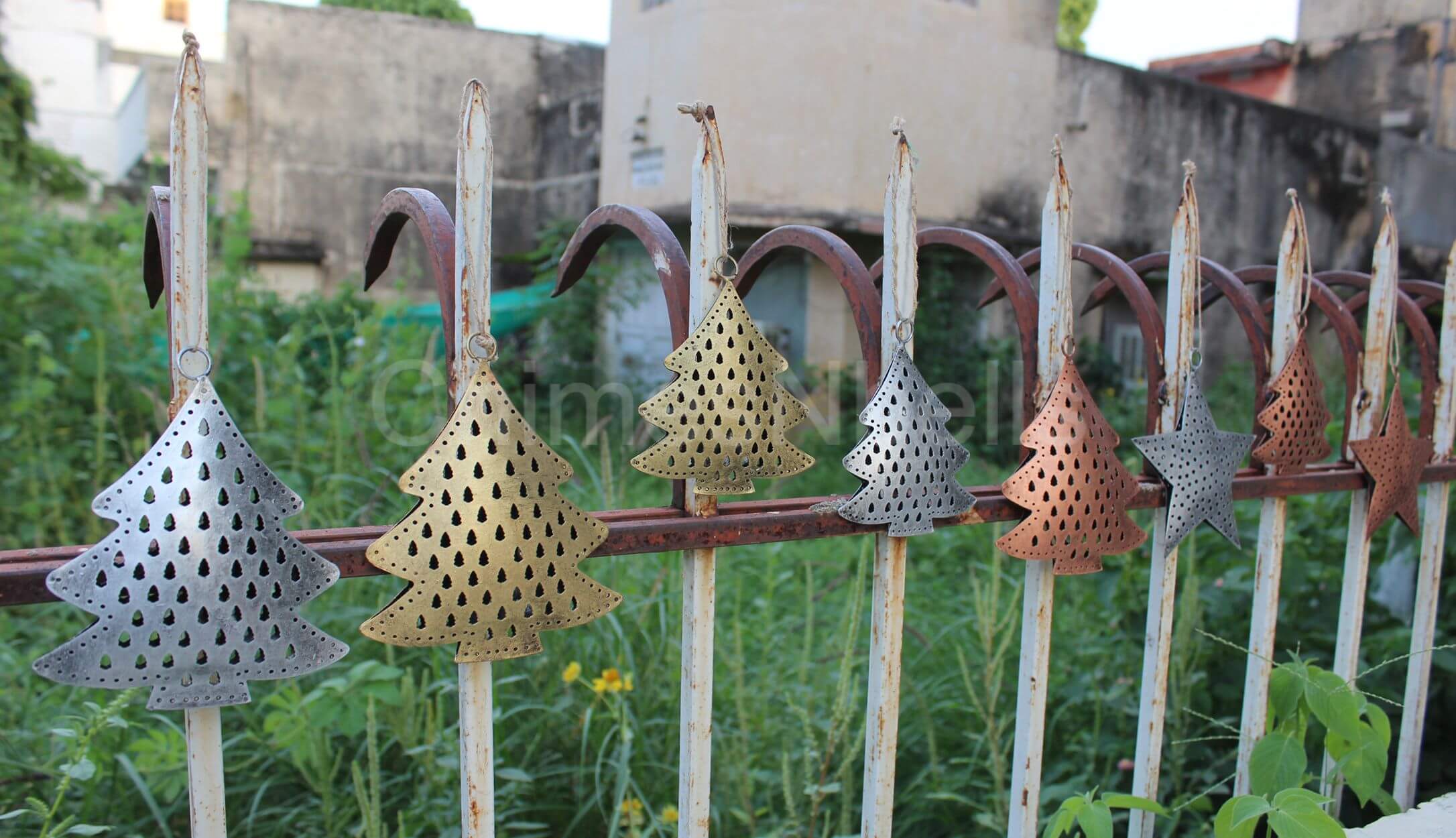 Festive recycled iron ornaments with unique designs. Durable, lightweight, and perfect for your Christmas tree decor!