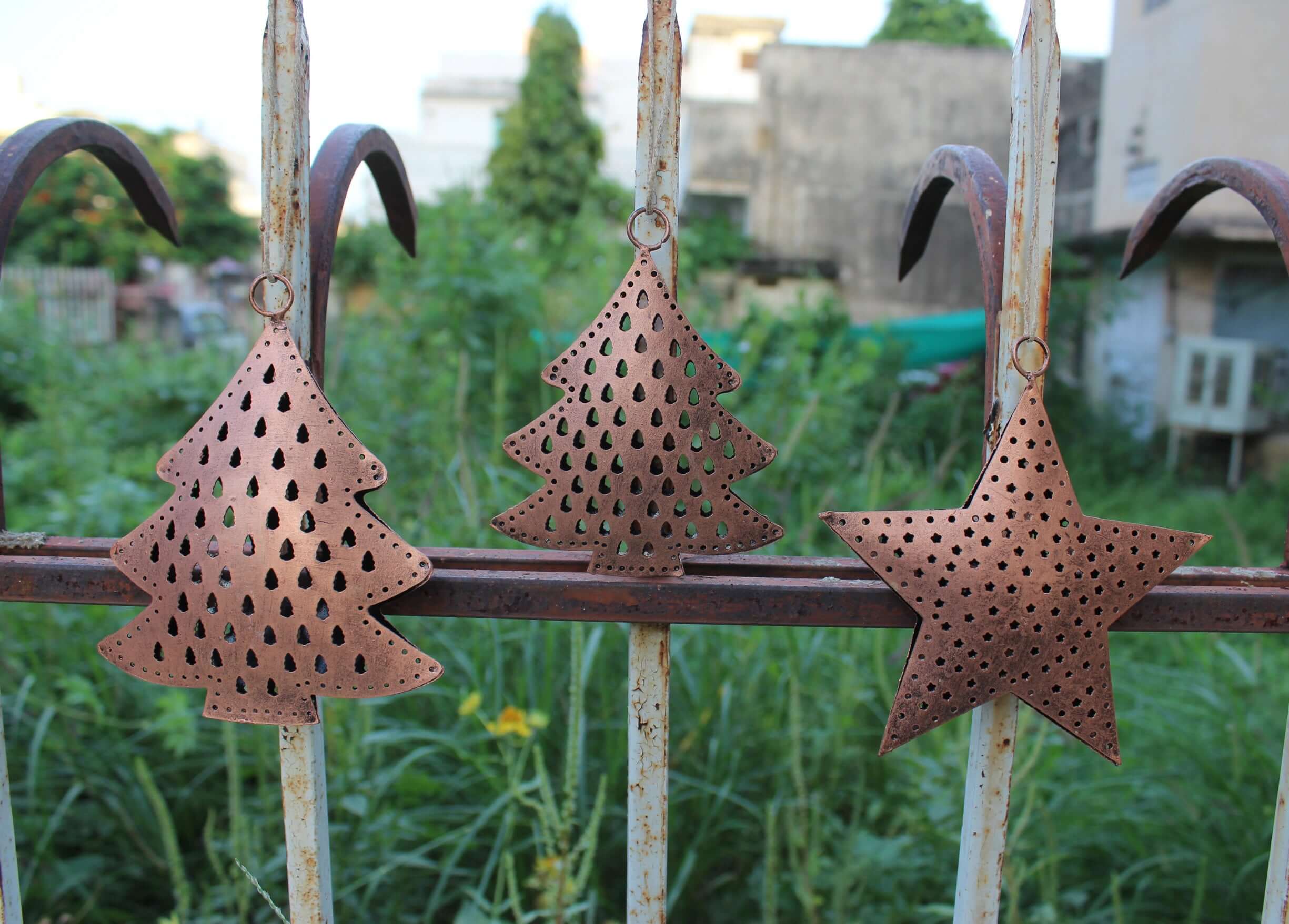 Festive recycled iron ornaments with unique designs. Durable, lightweight, and perfect for your Christmas tree decor!