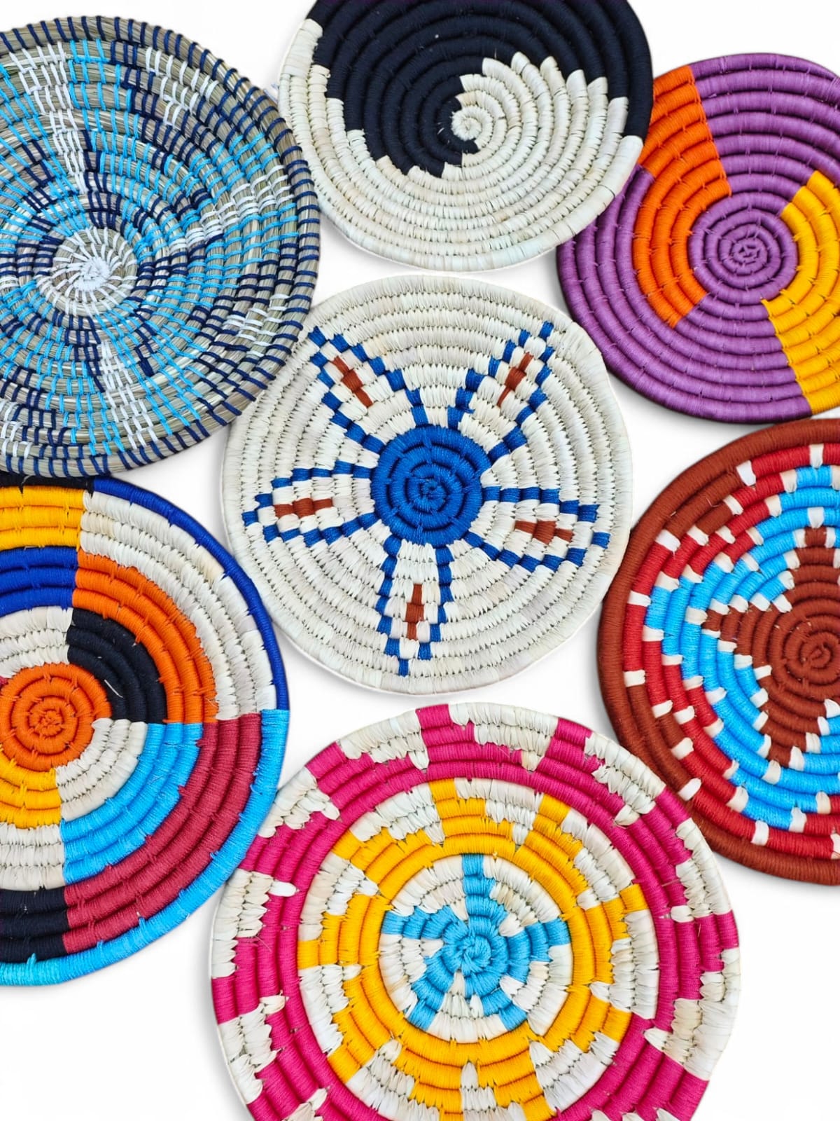 Multicolor handwoven rattan wall baskets set featuring bohemian designs, perfect for wall art and decor.