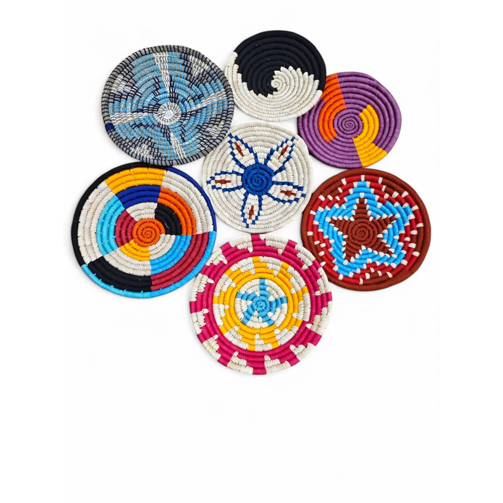 Set of 7 multicolor handwoven rattan wall baskets, perfect for bohemian wall art and home decor.