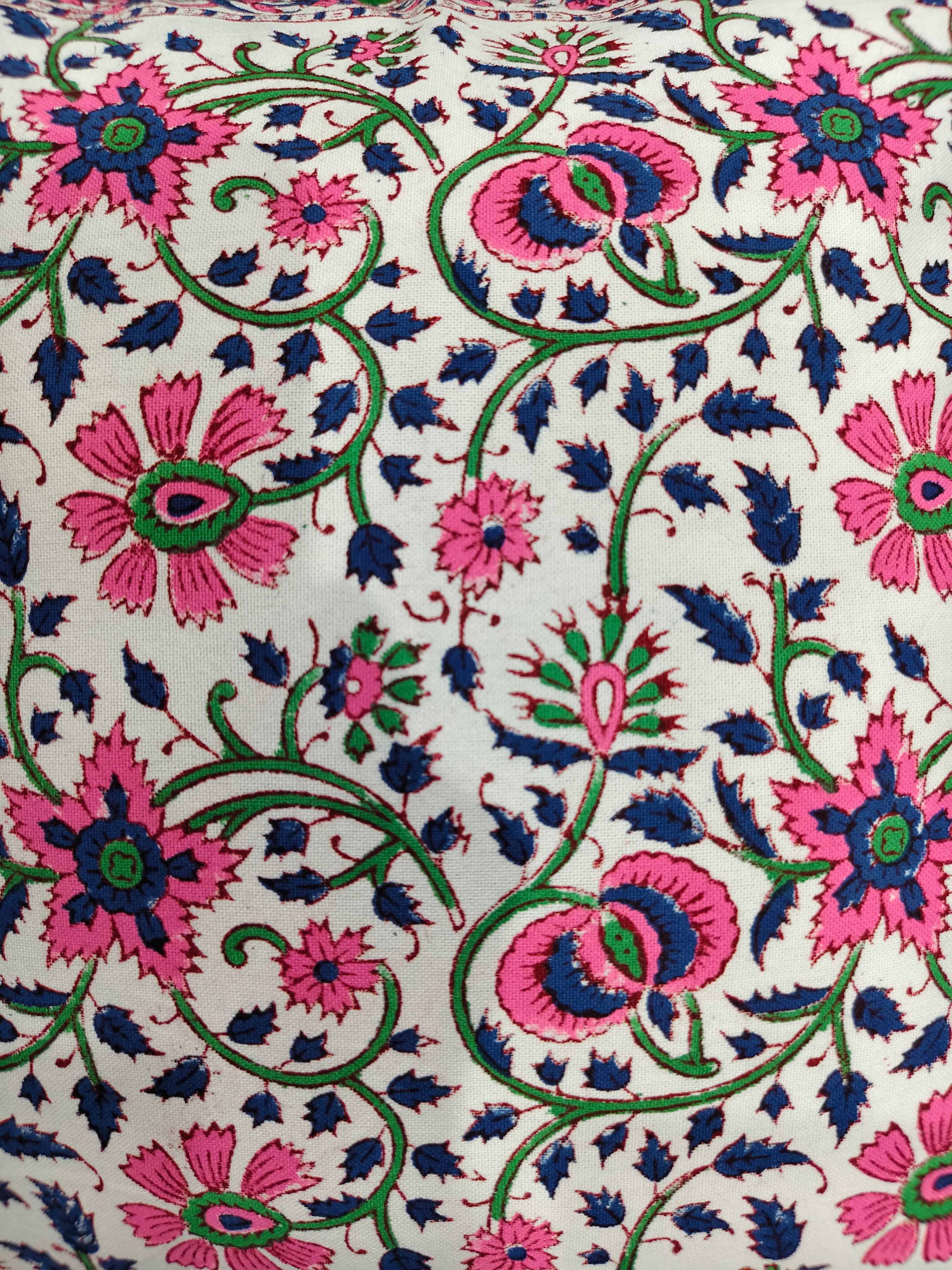 Floral embroidered design in pink and navy on white cotton cushion cover, perfect for elegant home decor.