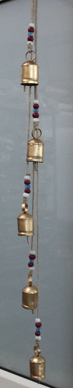 Antique look hanging bells mobile with colorful beads, perfect for indoor or garden decor, creating a soothing ambiance.