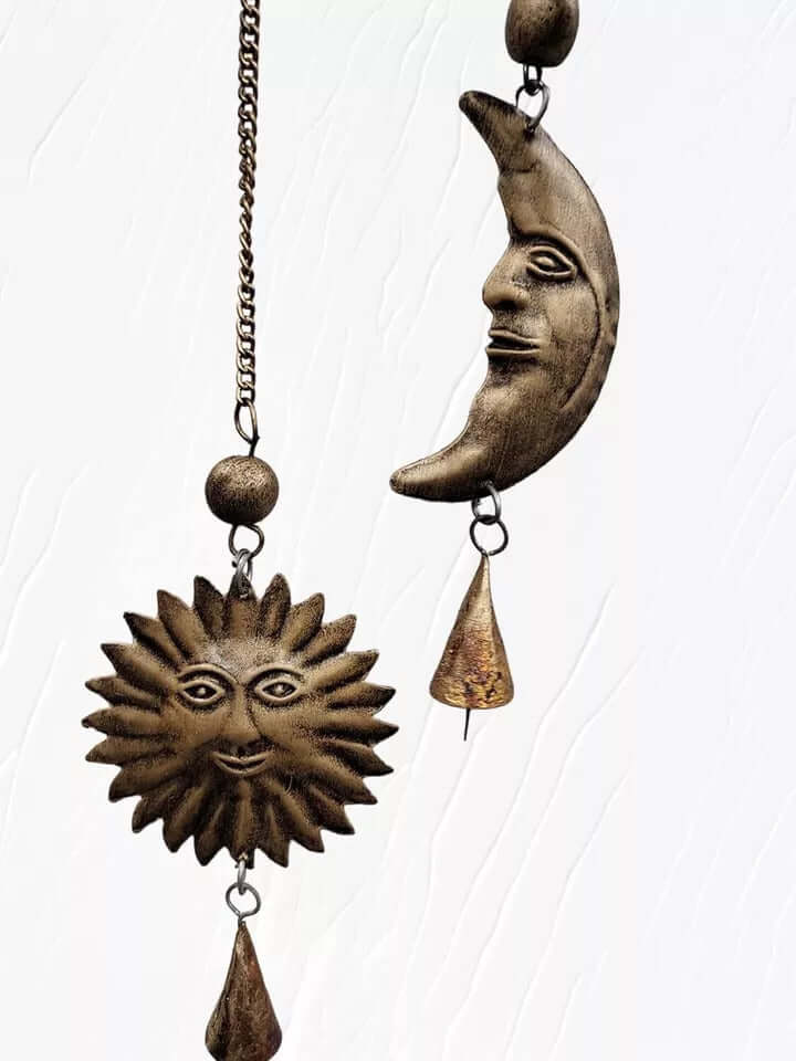 Antique look sun and moon wind chime, handcrafted with rustic bells, perfect for indoor and outdoor decor.