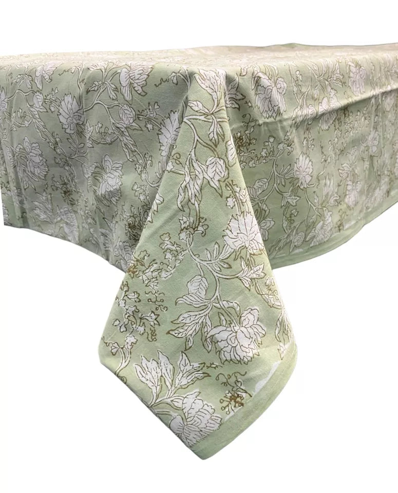 Elegant Indian hand block print tablecloth in soft green with floral patterns, perfect for holidays and everyday use.