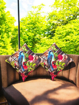 Colorful set of 2 bird digital print cushion covers on a sofa, perfect for outdoor accents and decorative pillows.